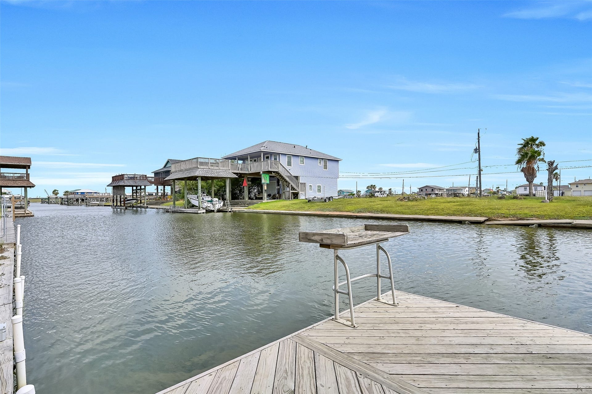 7119 Beau Rue Street, Hitchcock, TX 77563 Fish directly from your own dock which features a fish cleaning station.
