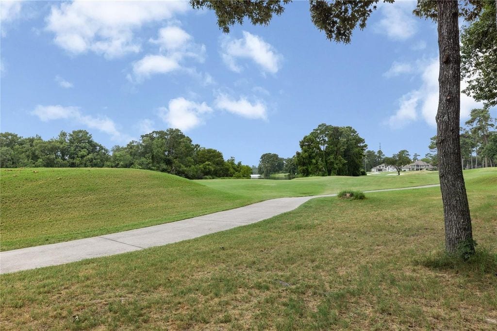 2214 Kings Trail, Kingwood, TX 77339 Enjoy living in a golf course community. A golf cart ride from The Clubs of Kingwood golf courses and dining.