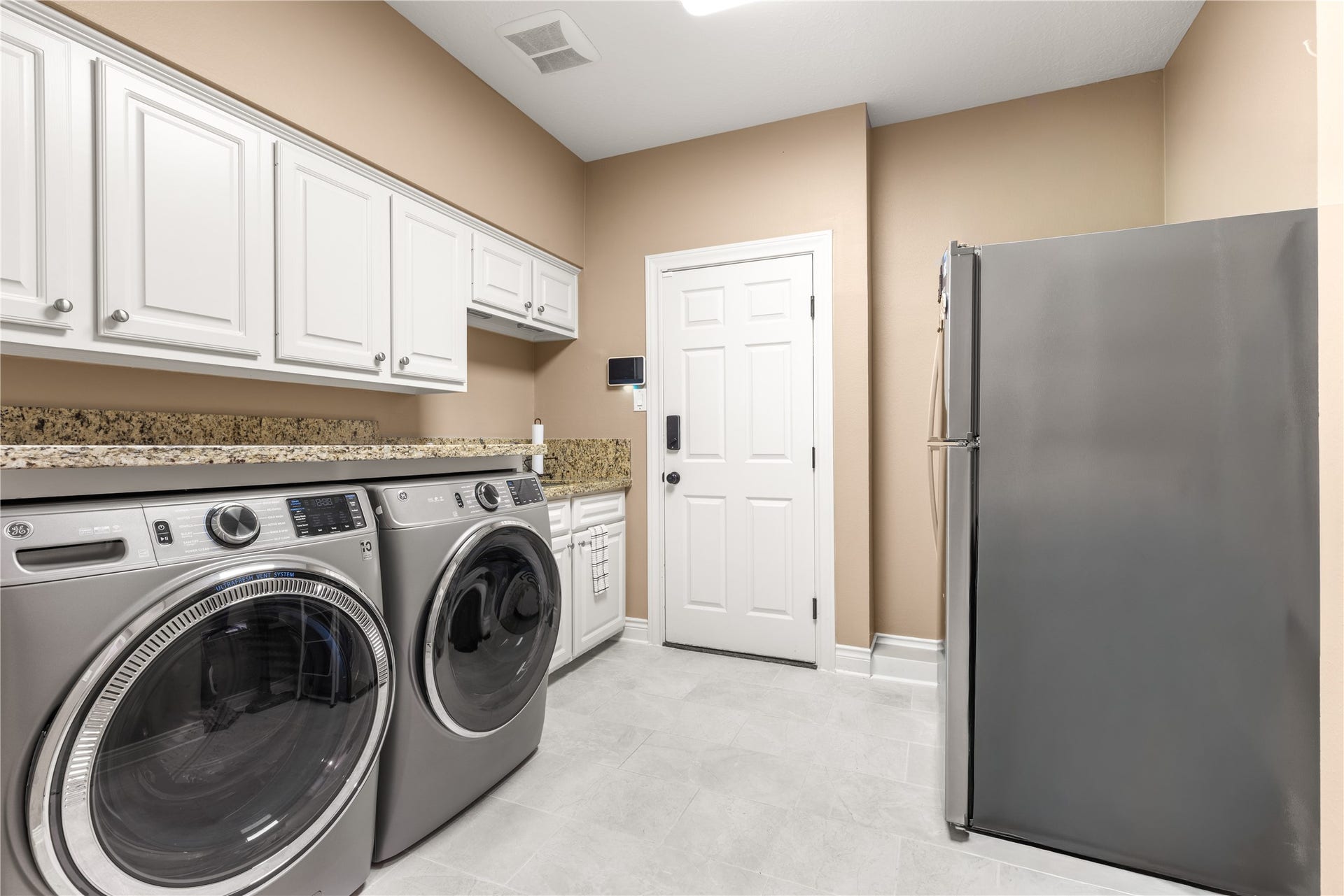 2214 Kings Trail, Kingwood, TX 77339 Utility room with sink and room for a refrigerator. 11x10