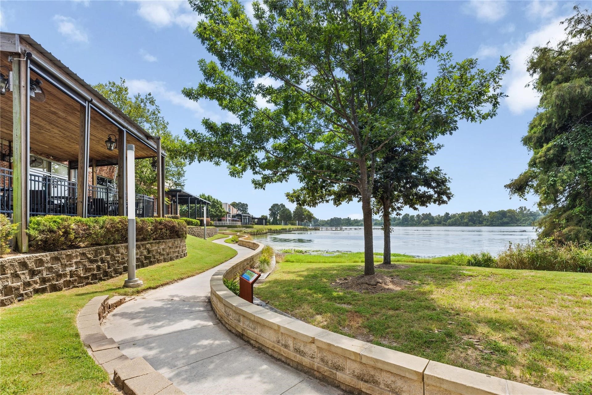 2214 Kings Trail, Kingwood, TX 77339 Just a short walk or golf cart ride to Kings Harbor.