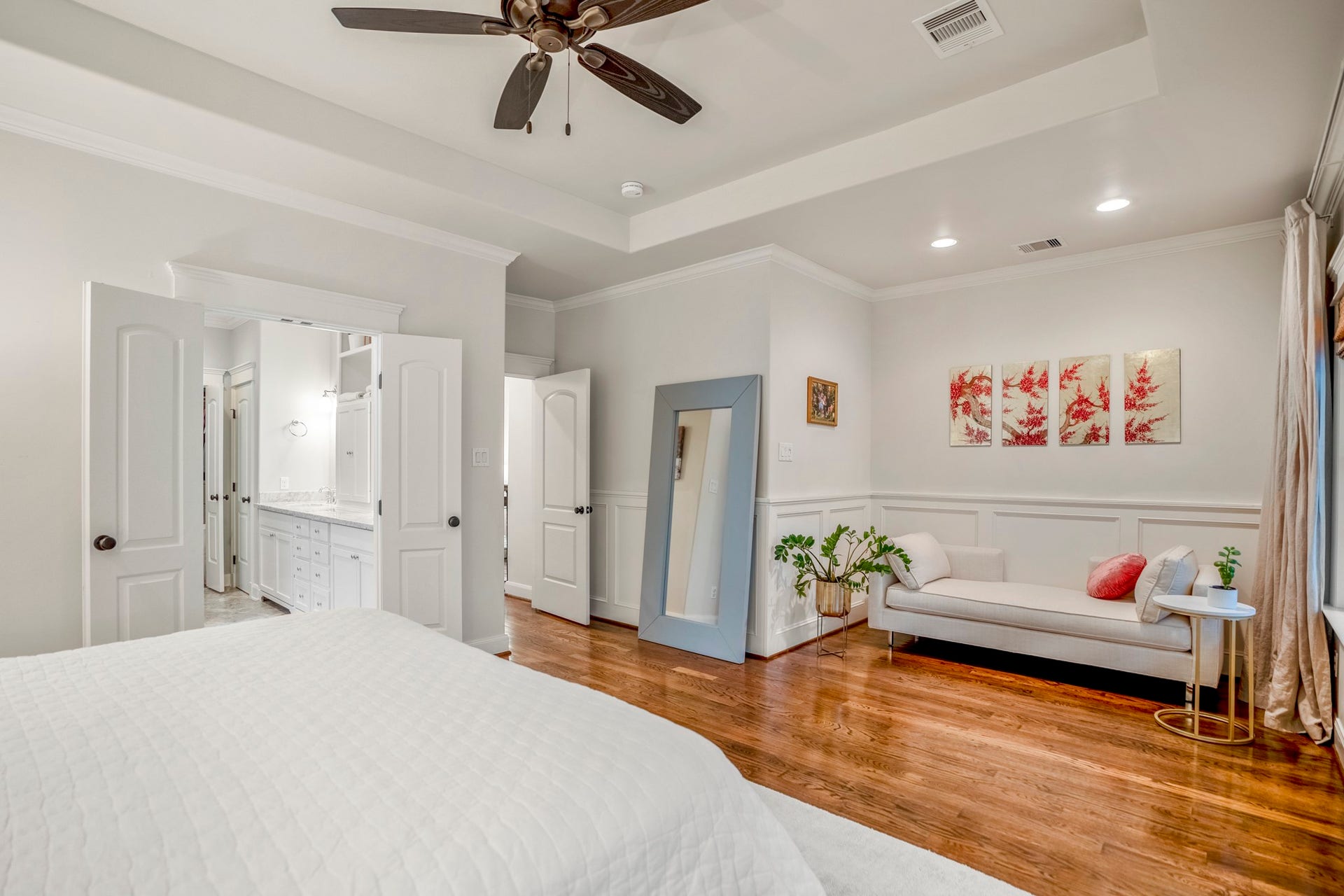 840 Tulane Street, Houston, TX 77007 Across from the bed is a recessed area with custom wood paneling that's perfect for a chaise lounge for a reading nook.