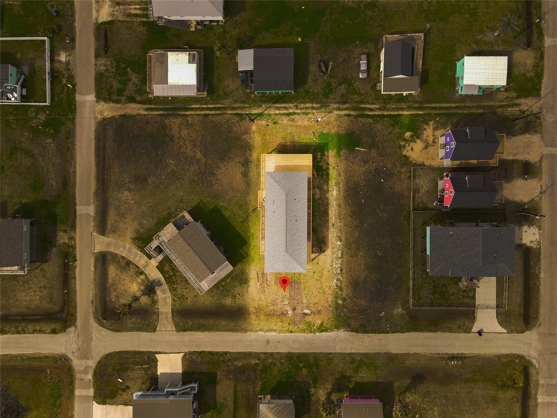 1014 Treaty Dr, Surfside Beach, TX 77541 Community amenities and surrounding area seen from above