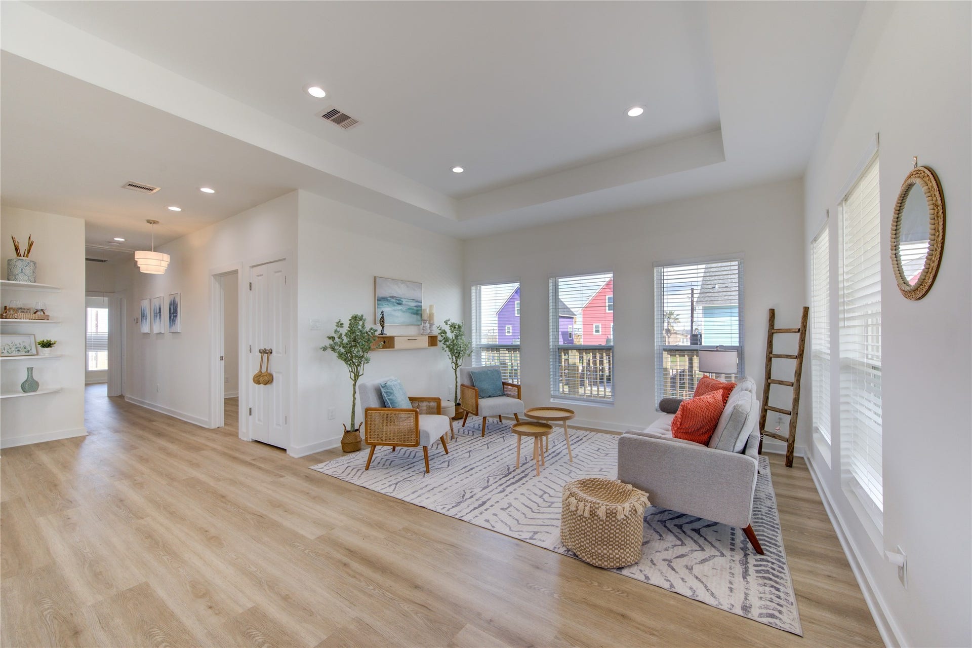 1014 Treaty Dr, Surfside Beach, TX 77541 Inviting living area with elegant flooring and abundant natural light