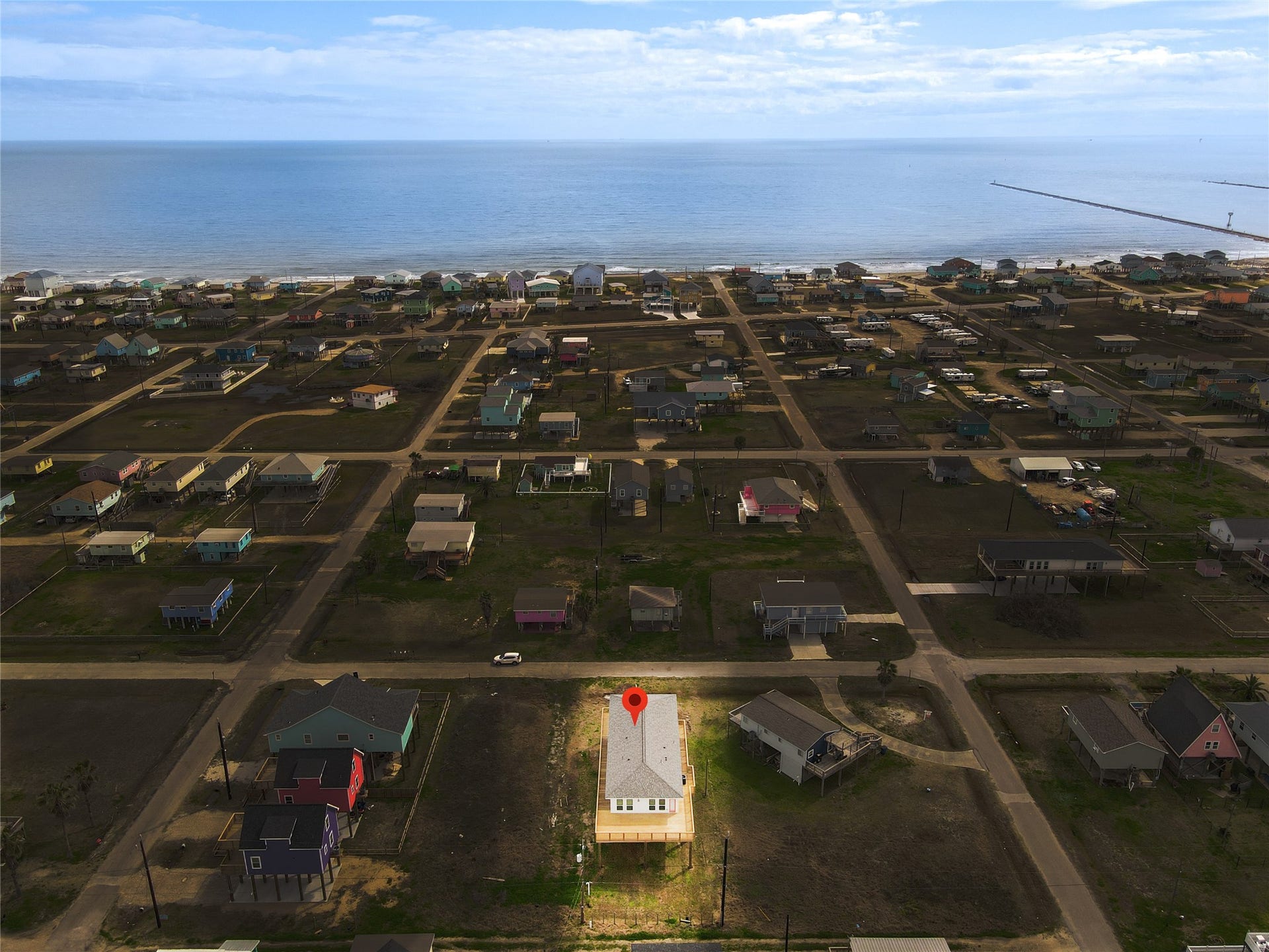 1014 Treaty Dr, Surfside Beach, TX 77541 Aerial overview highlighting location and investment potential