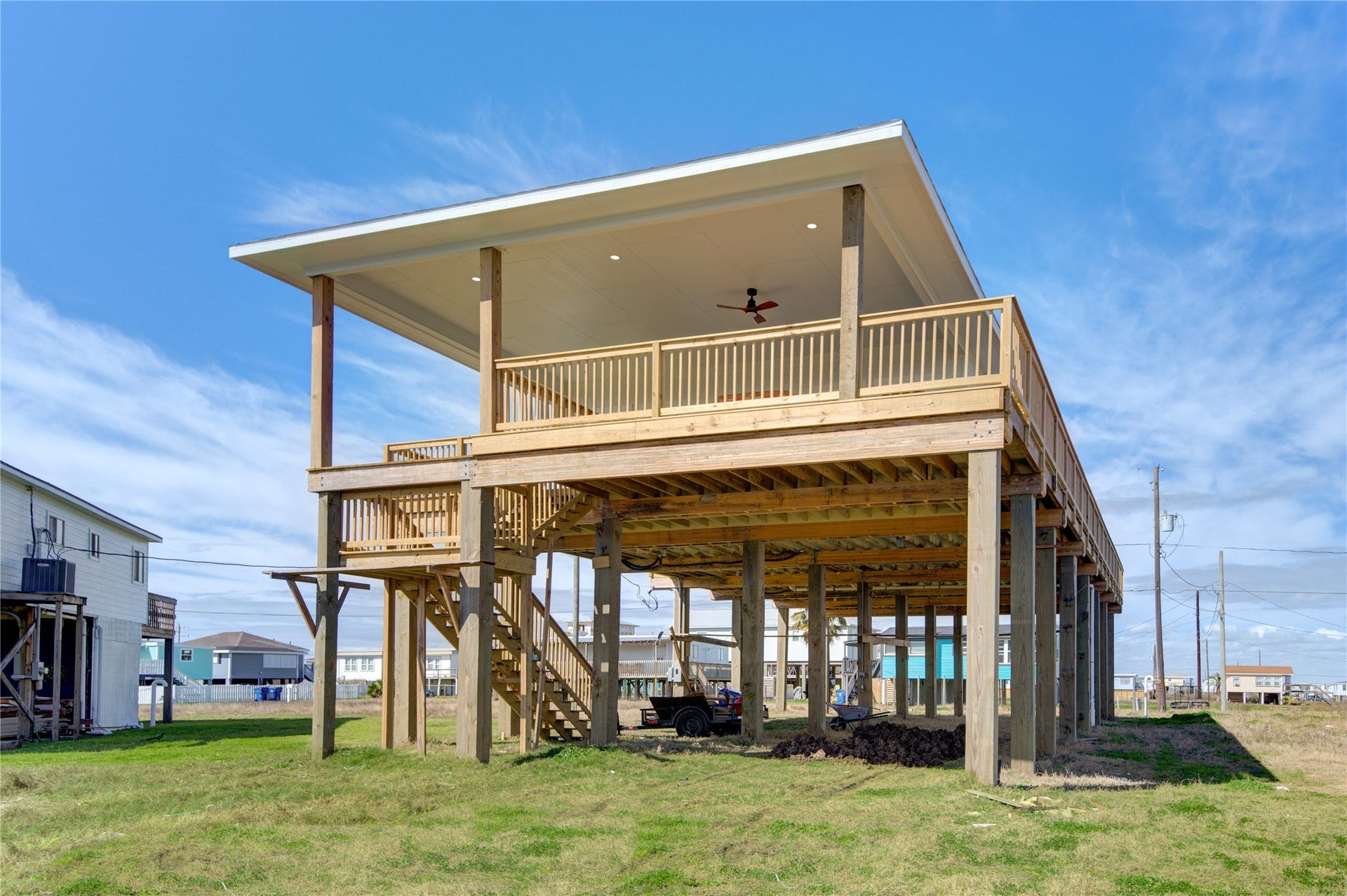 1014 Treaty Dr, Surfside Beach, TX 77541 Back view of elevated structure maximizing space and functionality