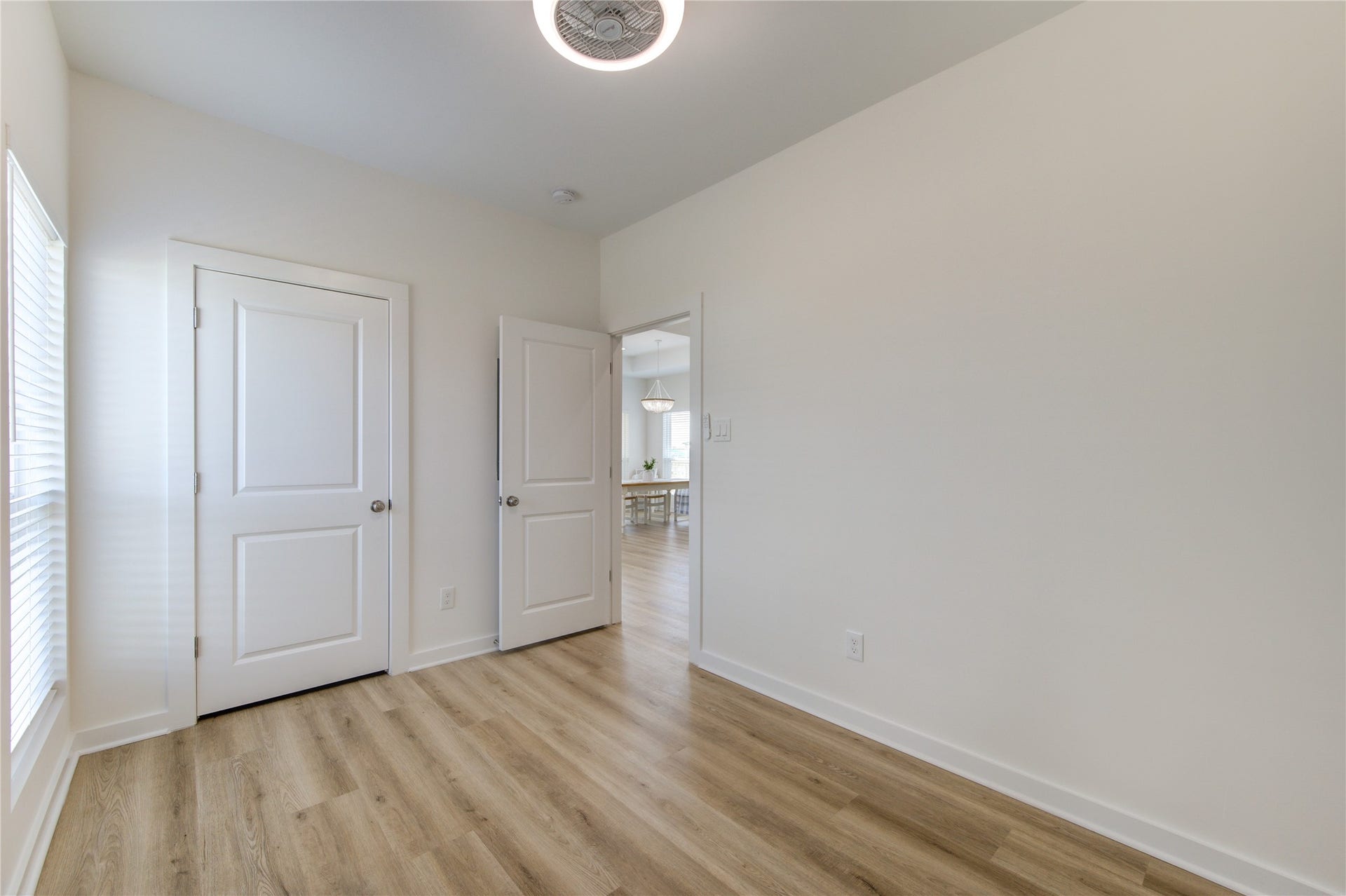 1014 Treaty Dr, Surfside Beach, TX 77541 Bright secondary bedroom with natural light and closet space