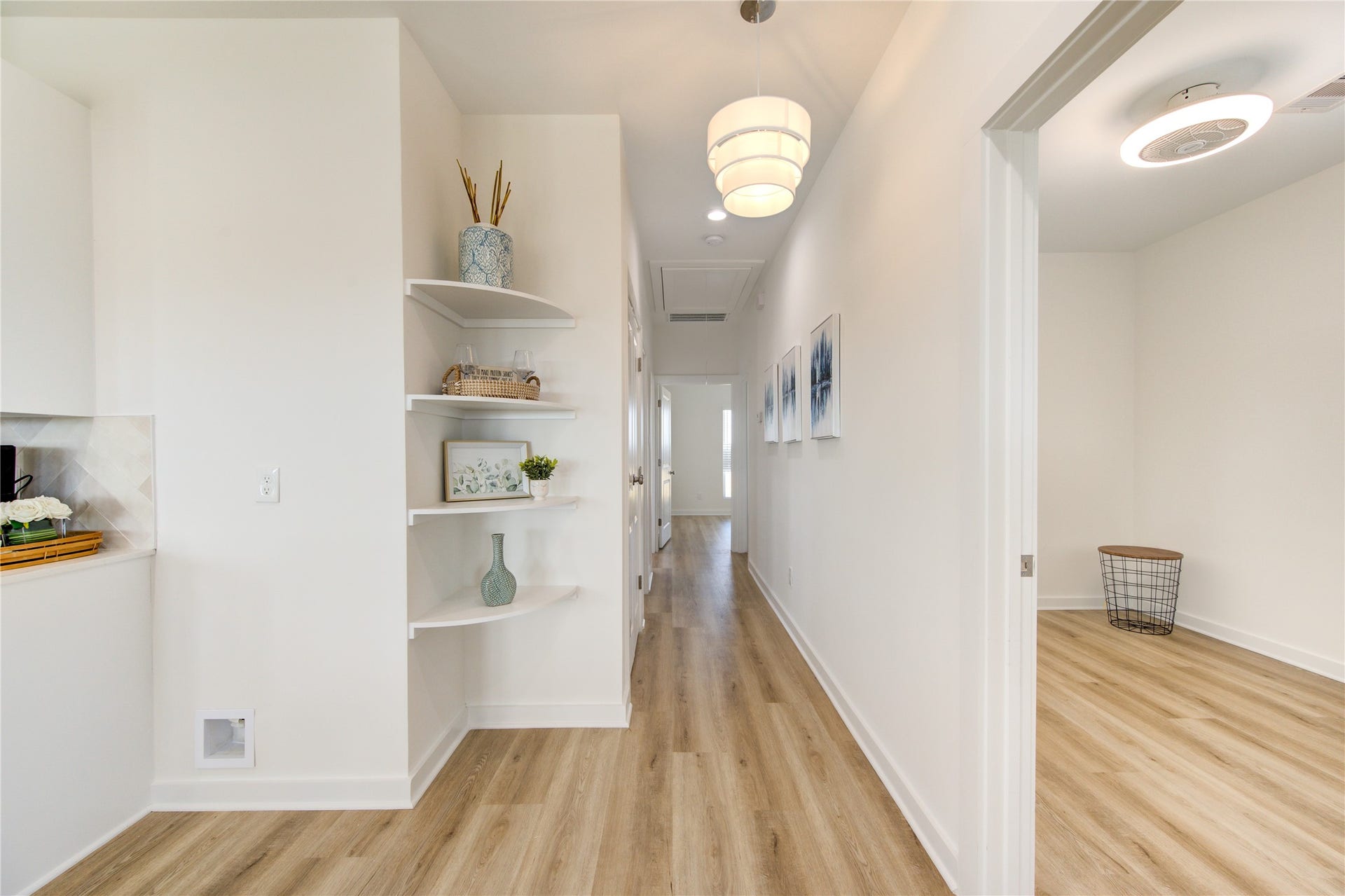 1014 Treaty Dr, Surfside Beach, TX 77541 Functional hallway with clean design and additional storage