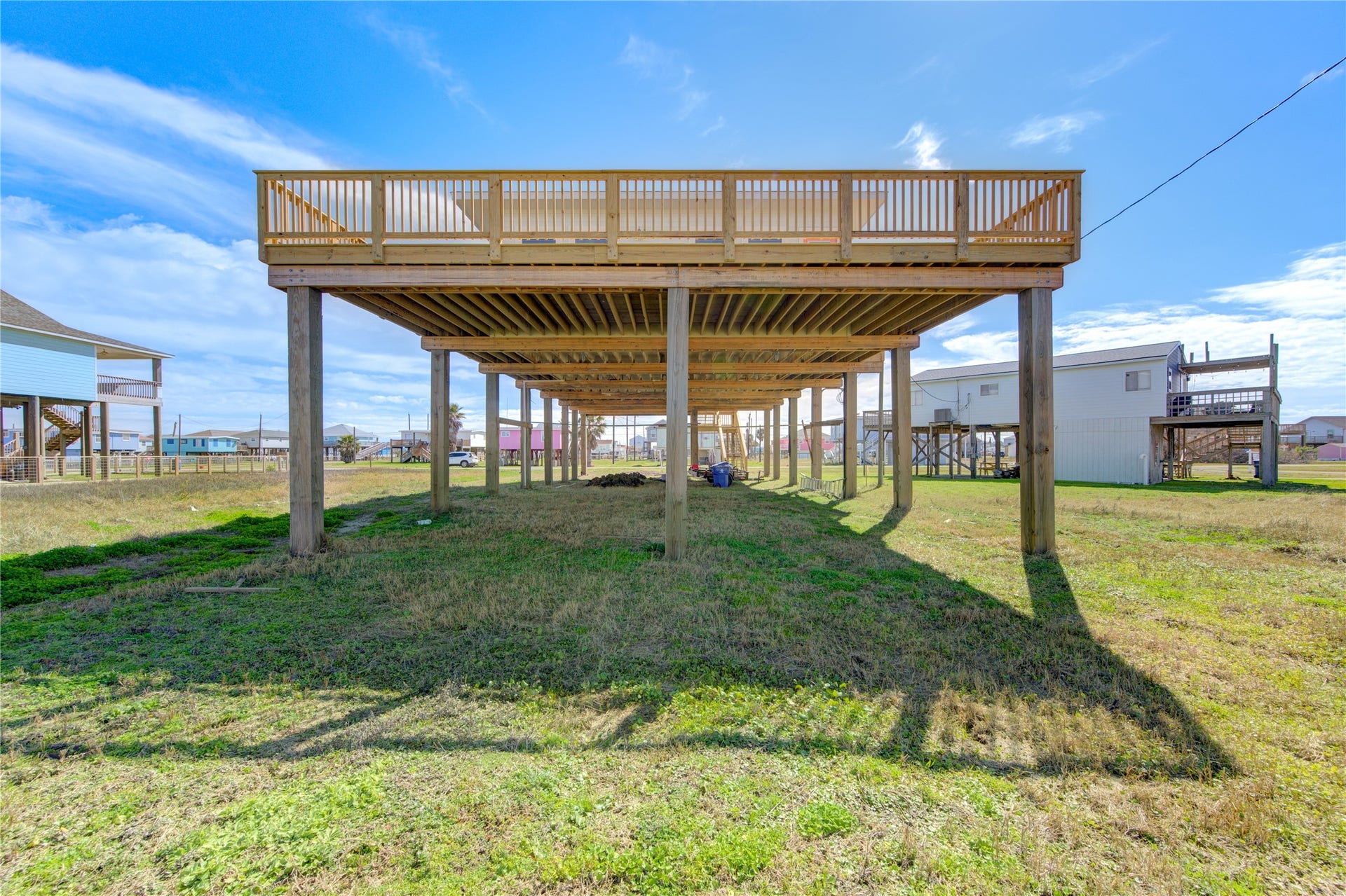 1014 Treaty Dr, Surfside Beach, TX 77541 Spacious ground-level area ideal for gatherings and outdoor activities