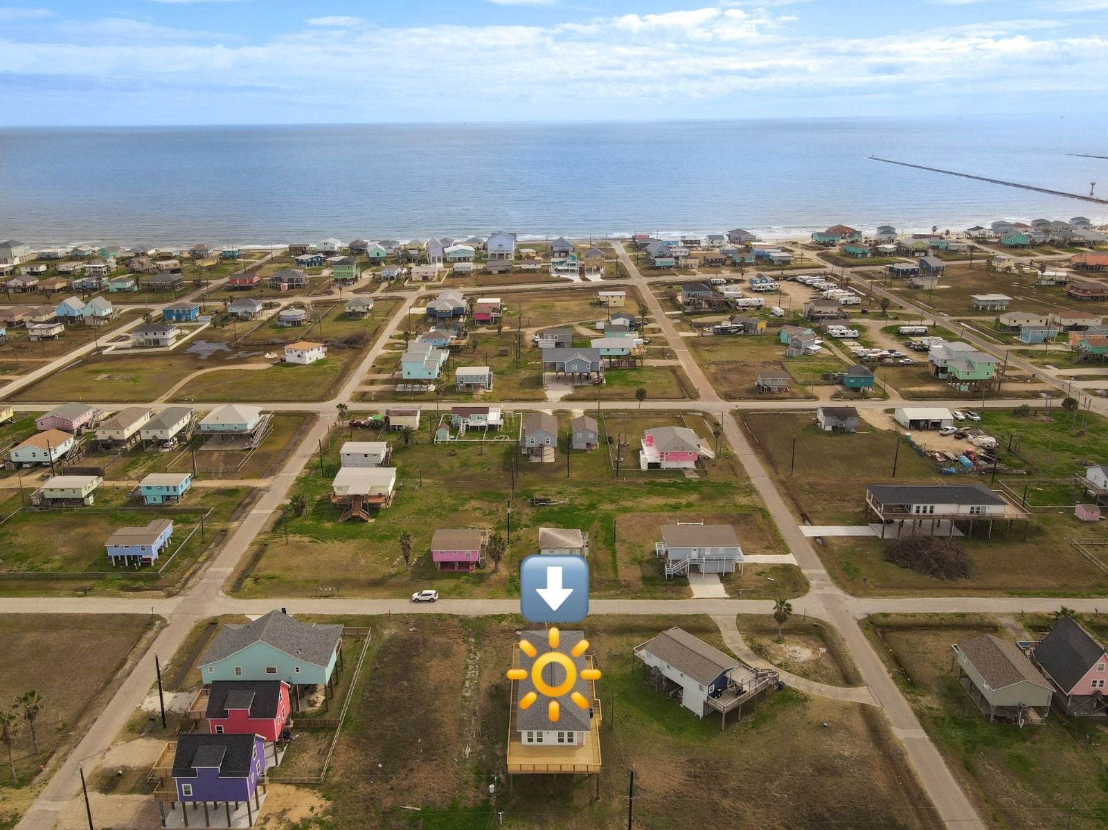 1014 Treaty Dr, Surfside Beach, TX 77541 Aerial view of the community showcasing proximity to the beach and surrounding area