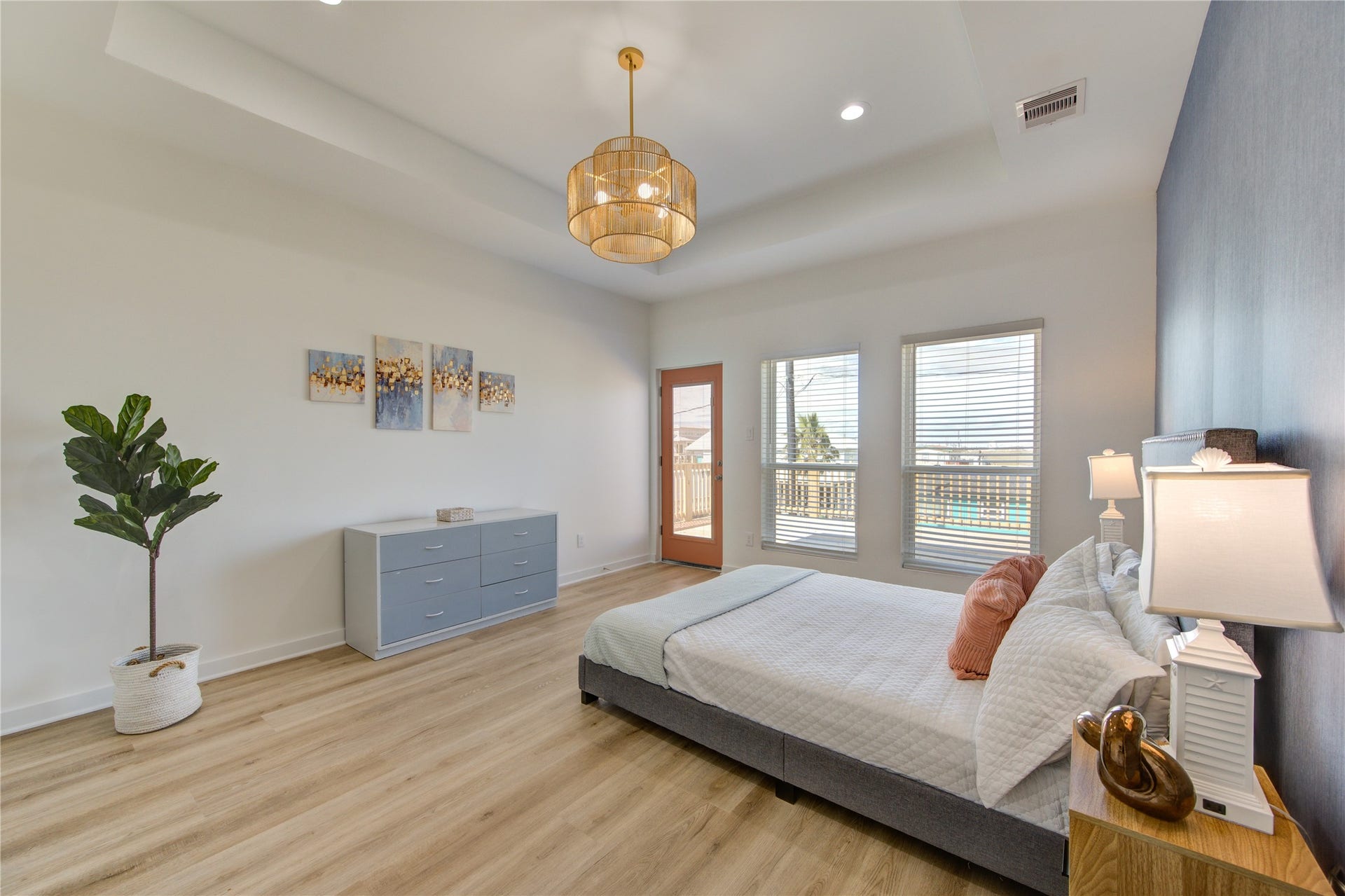 1014 Treaty Dr, Surfside Beach, TX 77541 Spacious primary bedroom with elegant design and relaxing ambiance