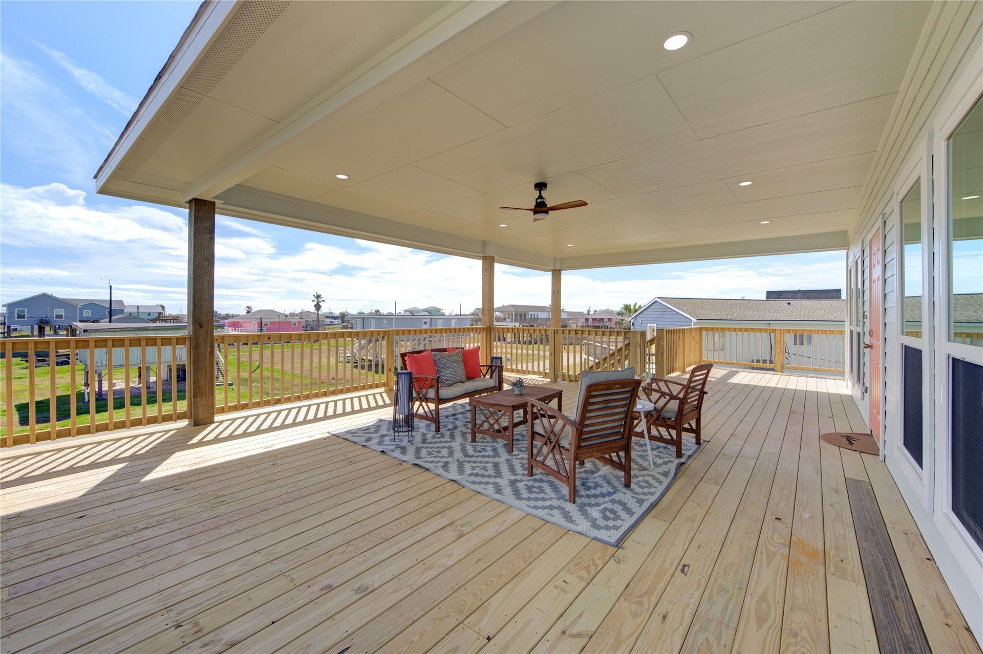 1014 Treaty Dr, Surfside Beach, TX 77541 Expansive covered deck perfect for outdoor dining and entertaining