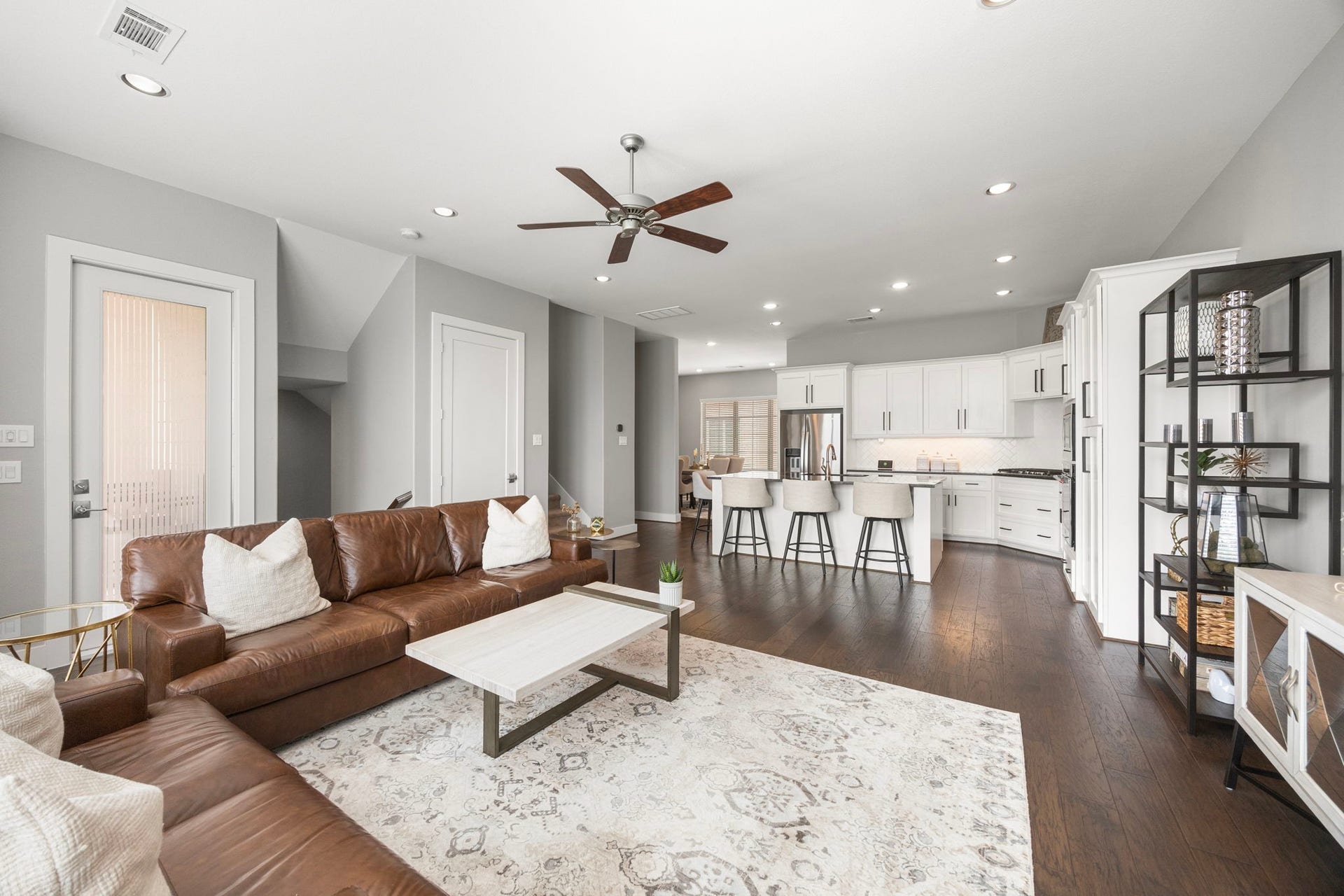 1216 Murrayhill Drive, Houston, TX 77043 Spacious open-concept living area seamlessly connects the kitchen, dining, and living spaces, perfect for modern living and entertaining.
