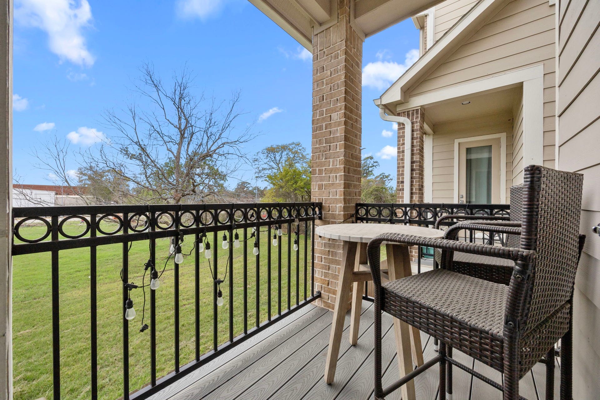 1216 Murrayhill Drive, Houston, TX 77043 Relax on your serene covered balcony, the perfect retreat after a busy day.