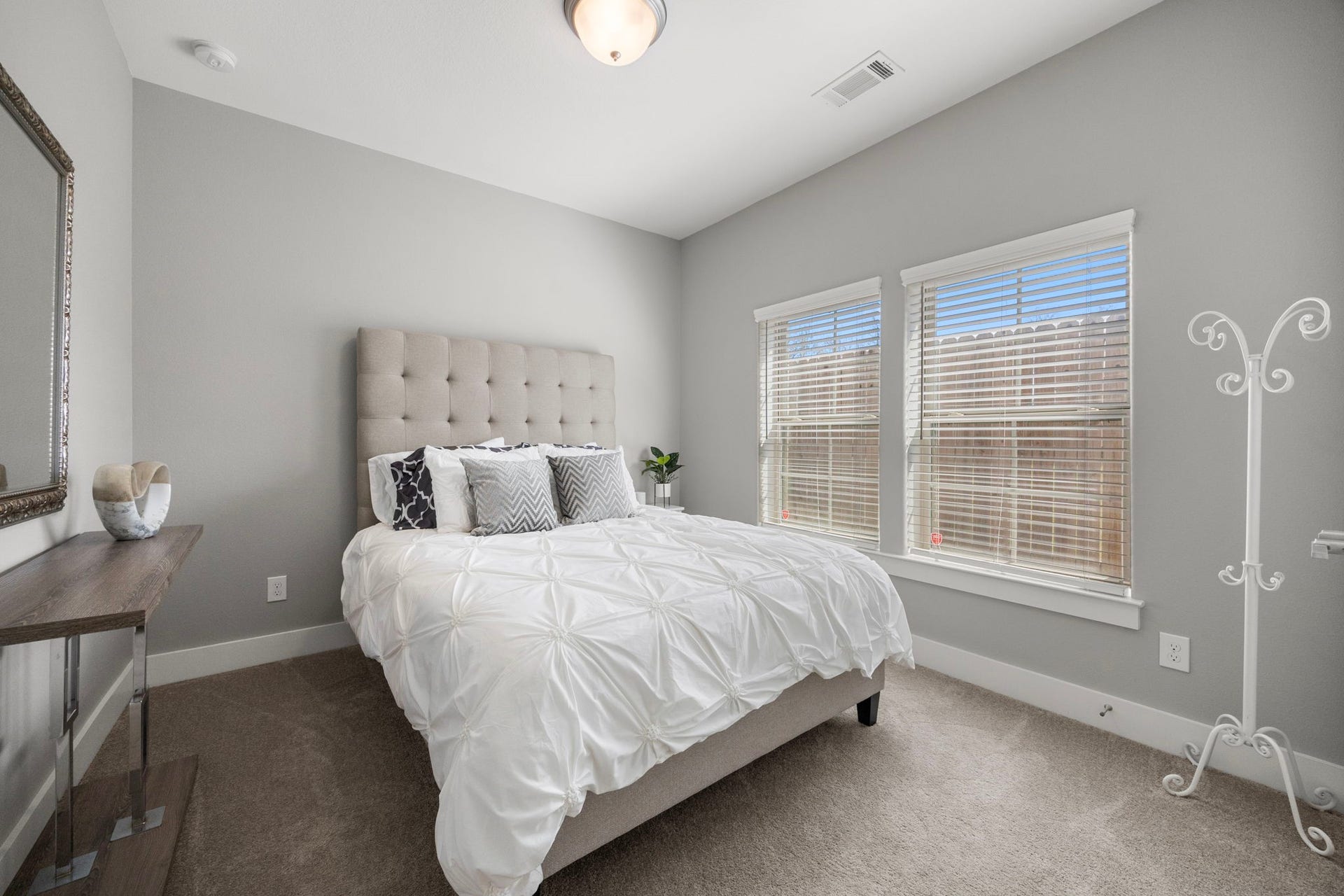 1216 Murrayhill Drive, Houston, TX 77043 First-floor secondary bedroom with ample natural light and cozy ambiance.