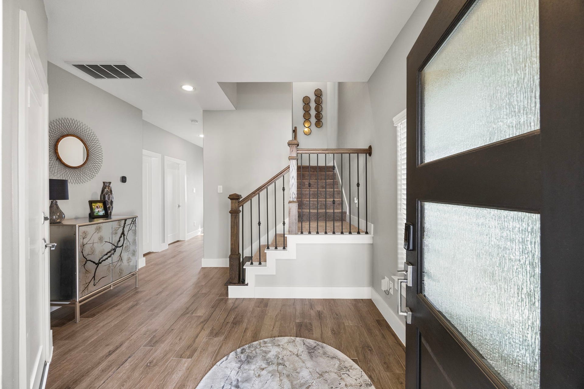 1216 Murrayhill Drive, Houston, TX 77043 First Level Living space - Welcome to a stunning entry level featuring two bedrooms and a full bathroom on the first floor!