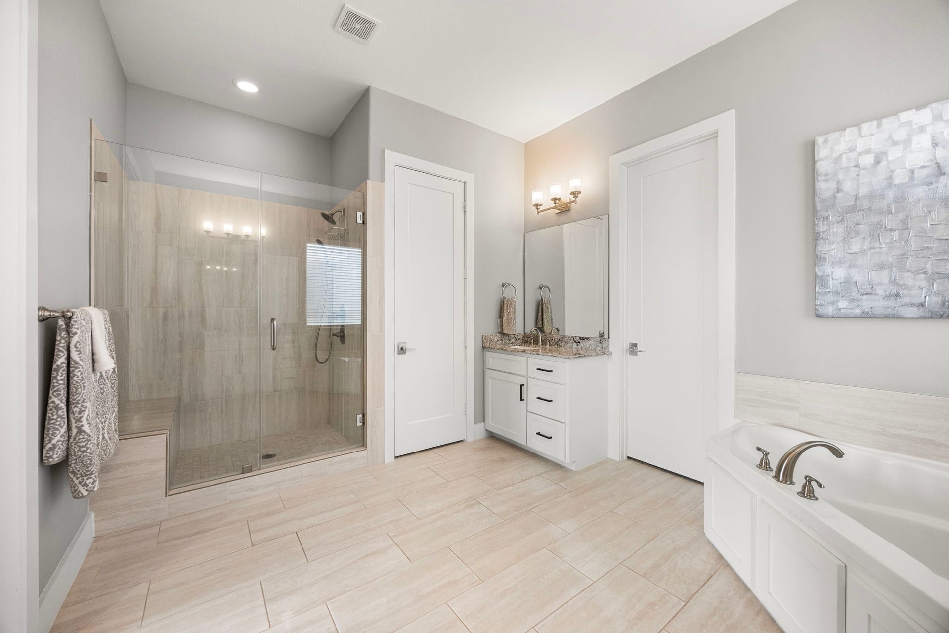 1216 Murrayhill Drive, Houston, TX 77043 Experience luxury in the primary bath's spacious walk-in shower.
