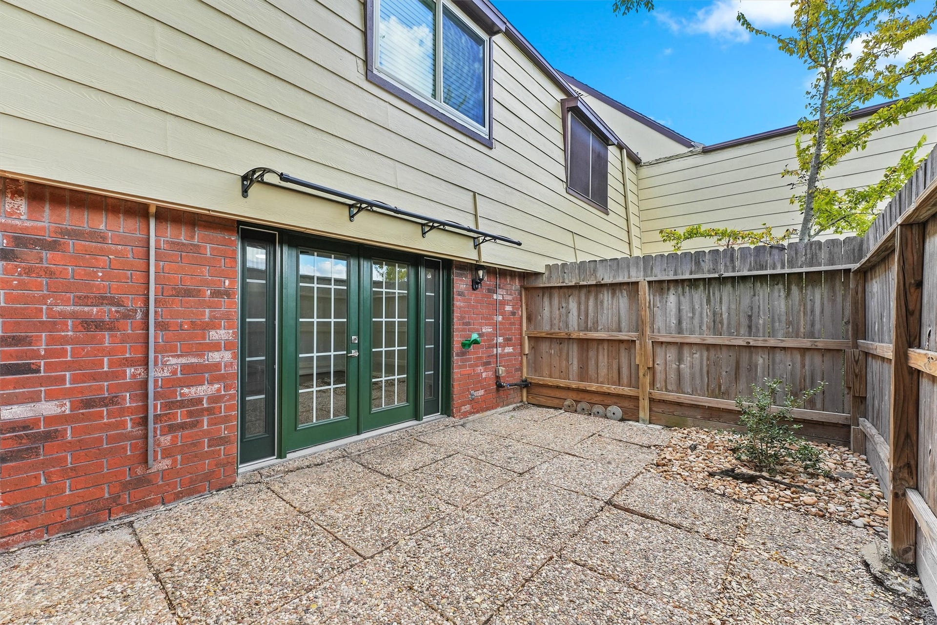 11550 Chimney Rock Road, #536, Houston, TX 77035 View of patio with rear entrance