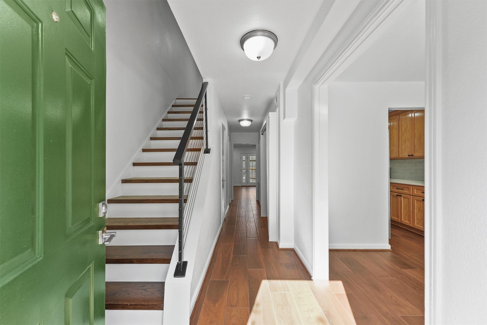 11550 Chimney Rock Road, #536, Houston, TX 77035 Wooden stairway leading to the 2nd floor with formal dining to the right