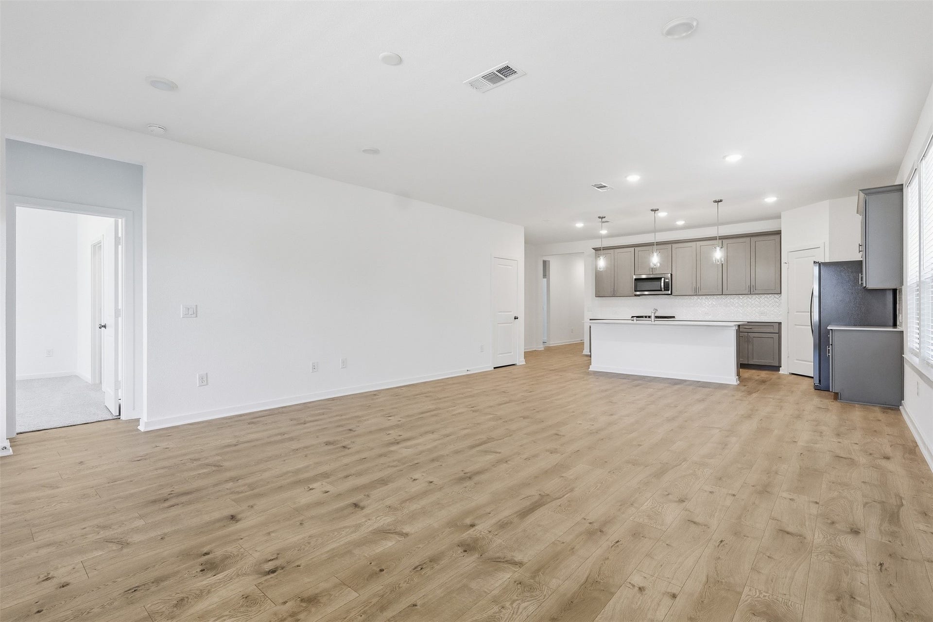18210 Ellerden Forest Drive, Tomball, TX 77377 Spacious living allows for multiple furniture configurations.