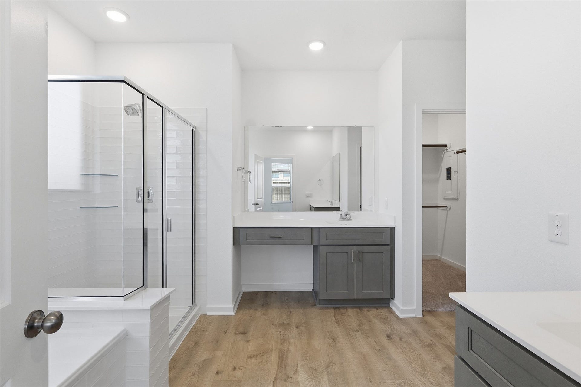 18210 Ellerden Forest Drive, Tomball, TX 77377 Primary Bath features two sinks, a vnaity, soaking tuba and separate shower.