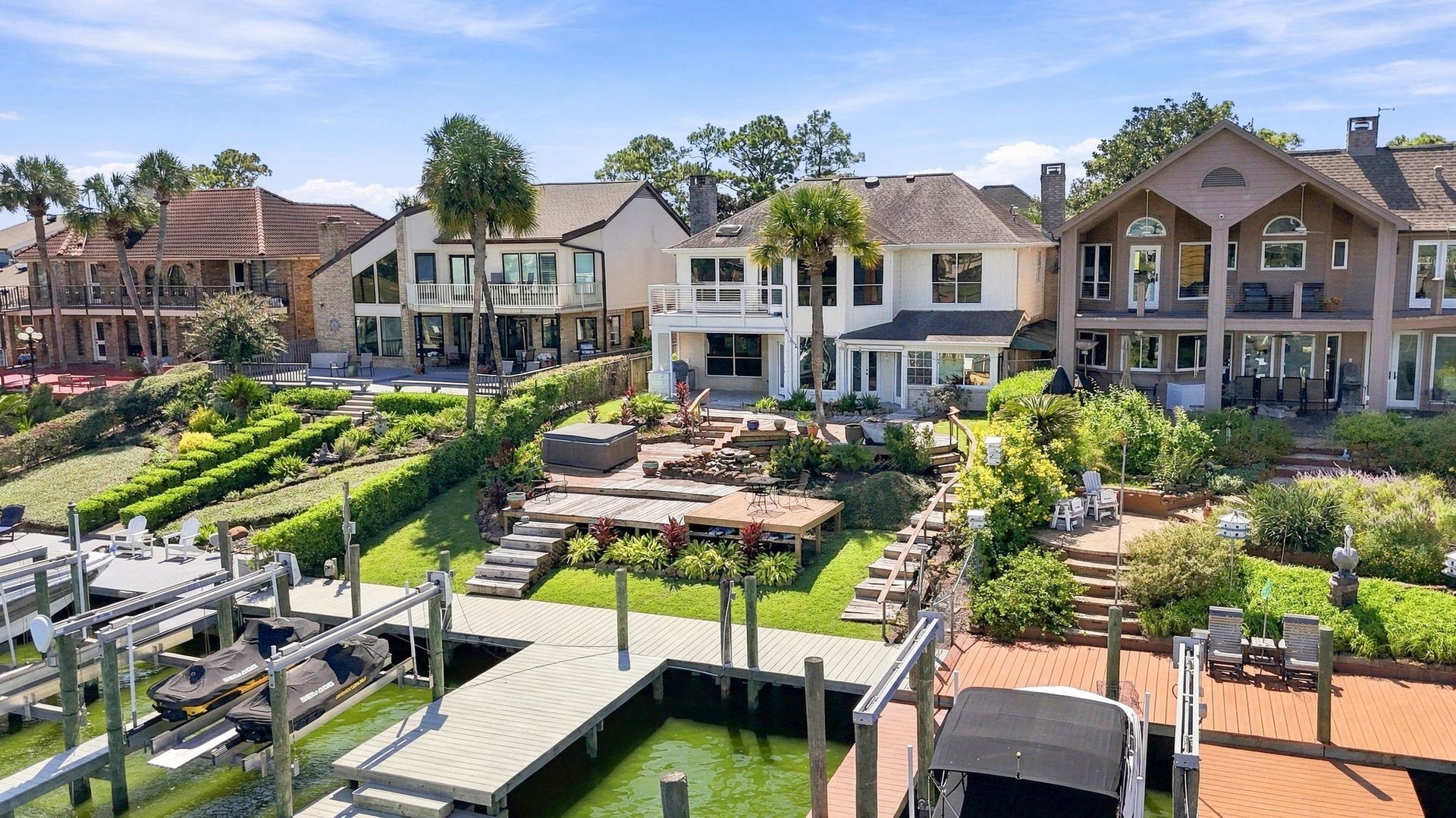 932 Plantation Street, League City, TX 77573 An aerial view shows the terraced backyard leading down to the private boat dock.