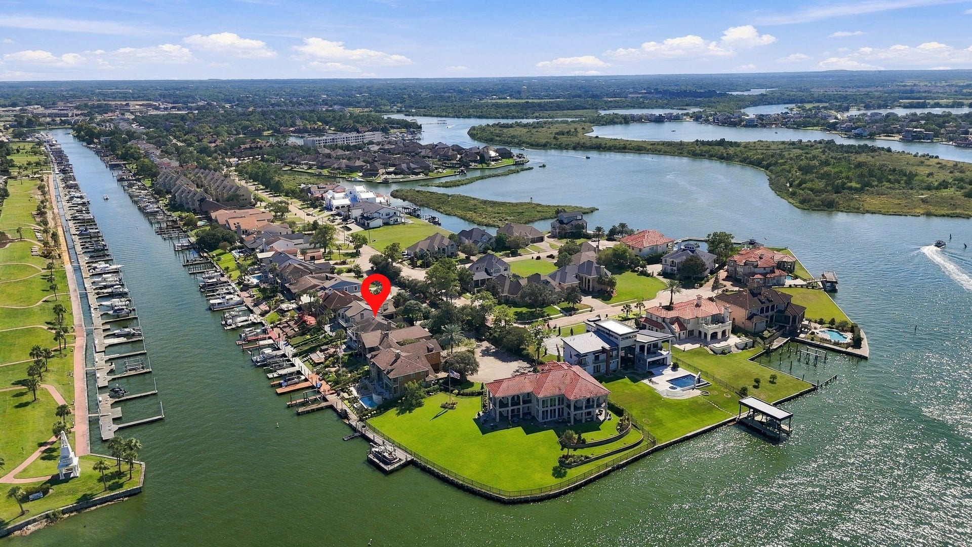 932 Plantation Street, League City, TX 77573 Additional aerial view of the community and the lake.