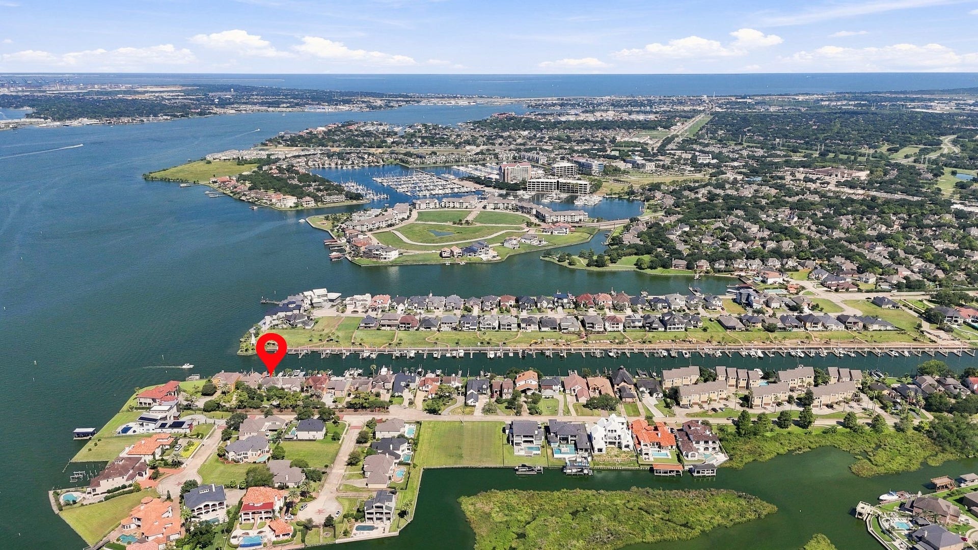 932 Plantation Street, League City, TX 77573 An aerial view shows the home's location on Clear Lake, with easy access to open water.