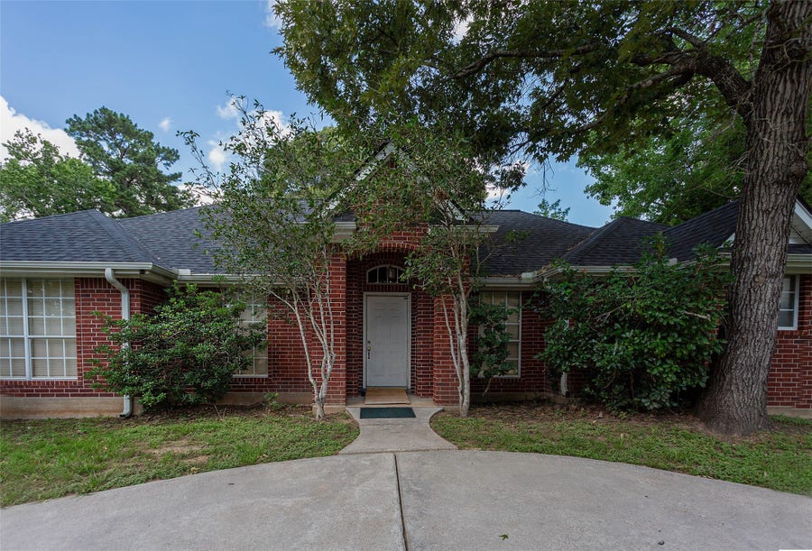 Property photo for 217 Tupelo Lane, Conroe, TX