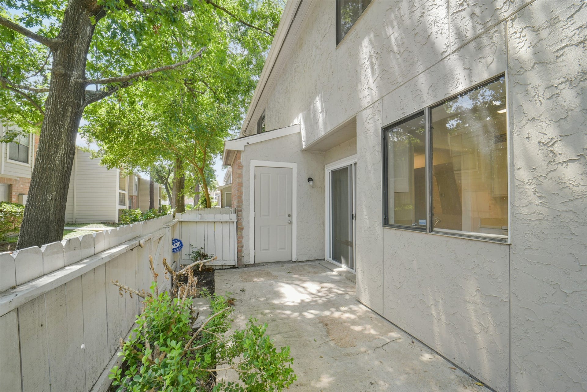 Your own private patio is the perfect place to relax in the shade after a long day of work.