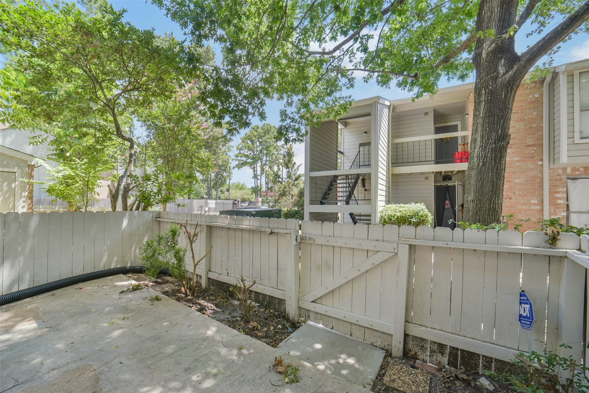 Your own private patio is the perfect place to relax in the shade after a long day of work.