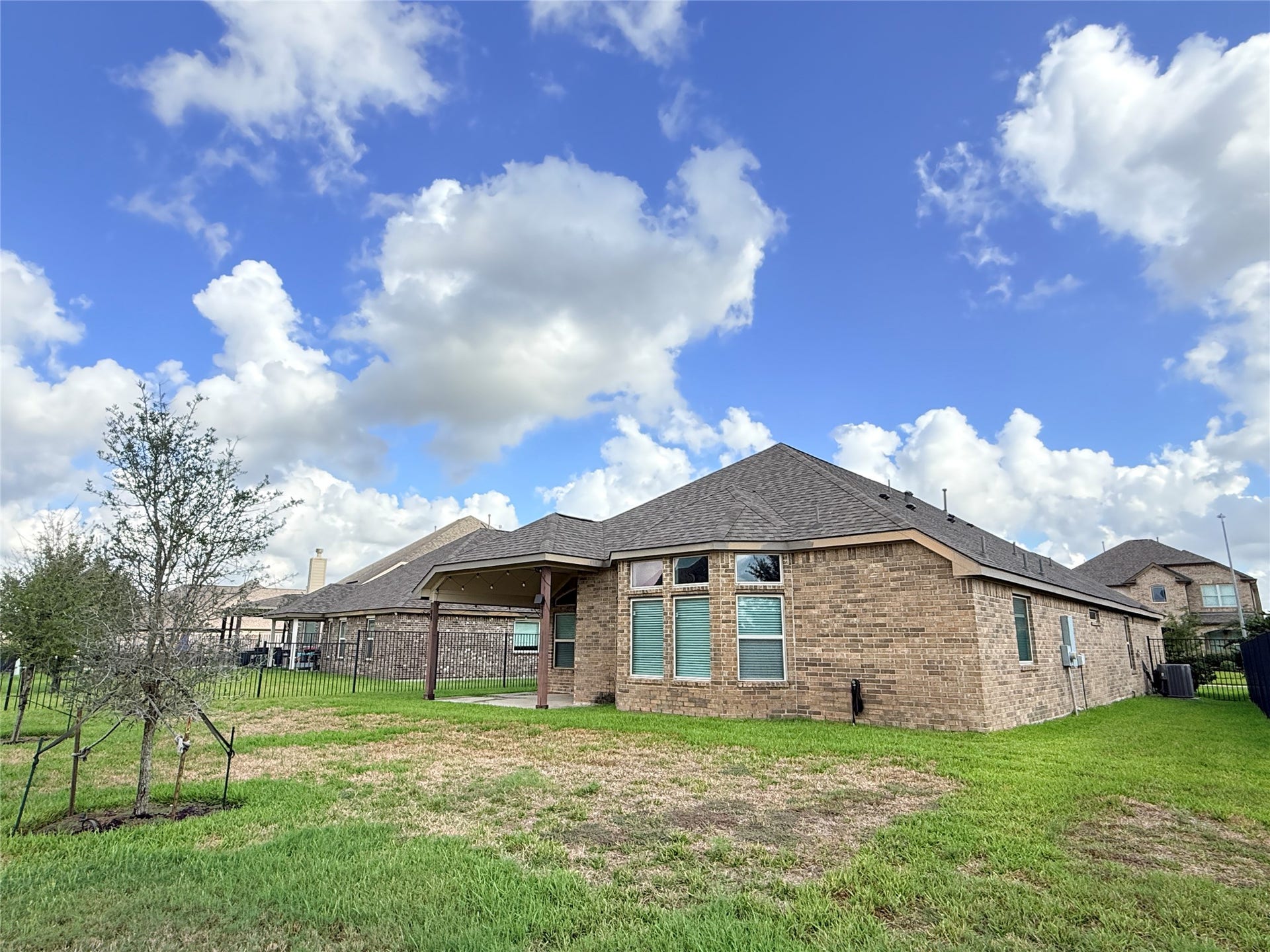 20635 Riley Copper Drive, Cypress, TX 77433 Brick on all 4 sides, a full yard sprinkler system and great leg room for your furry friends.
