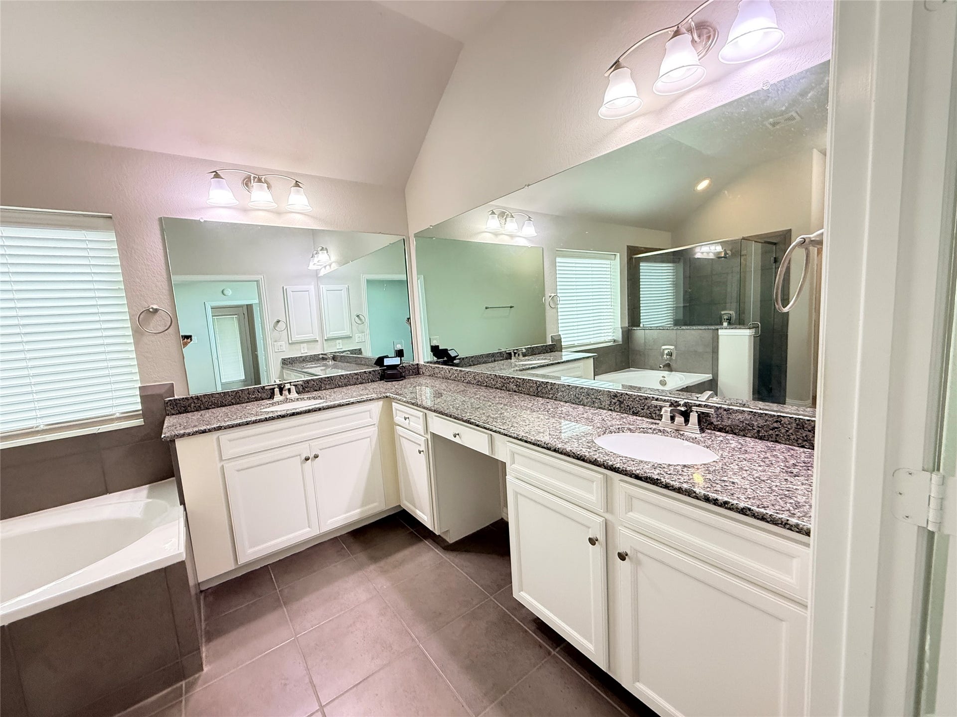 20635 Riley Copper Drive, Cypress, TX 77433 The primary bathroom has extended vanity space, including a knee space and dual sinks.