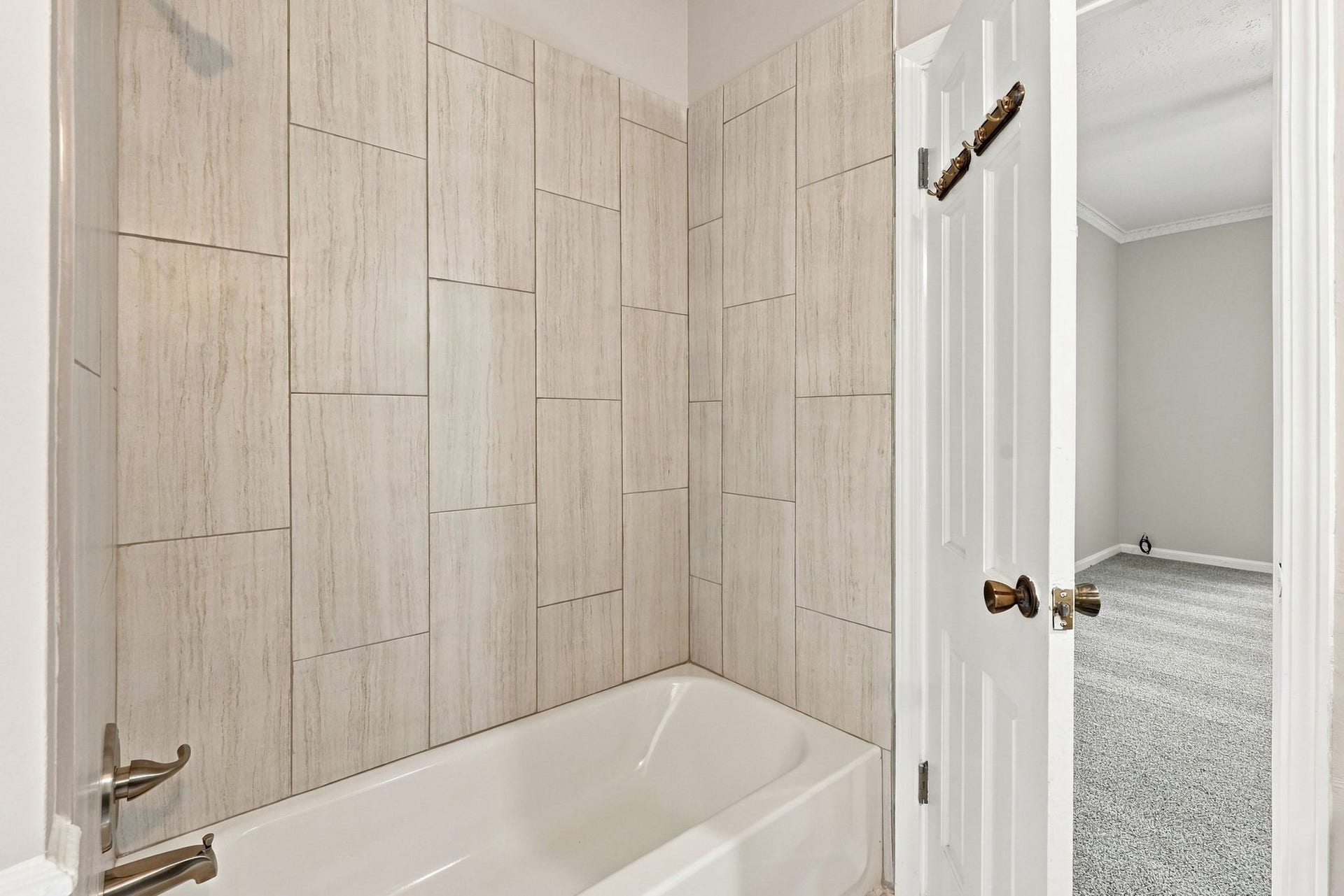 713 Palmer Drive, Conroe, TX 77302 Shower with new tile and tub installed