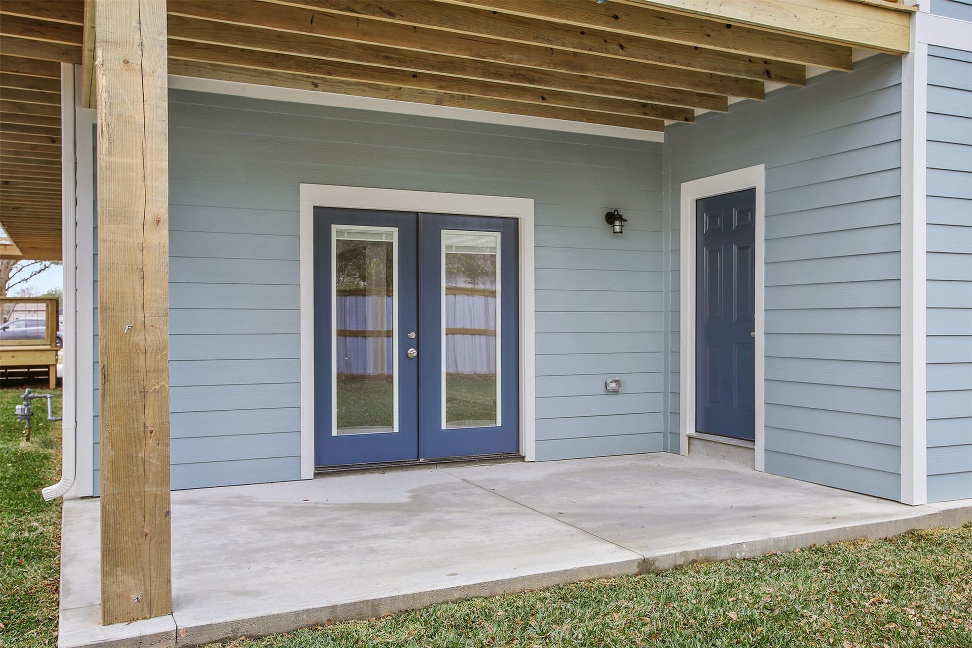 3617 Pecan Drive, Bacliff, TX 77518 Downstairs back patio with french doors to the garage and door to the downstairs bathroom