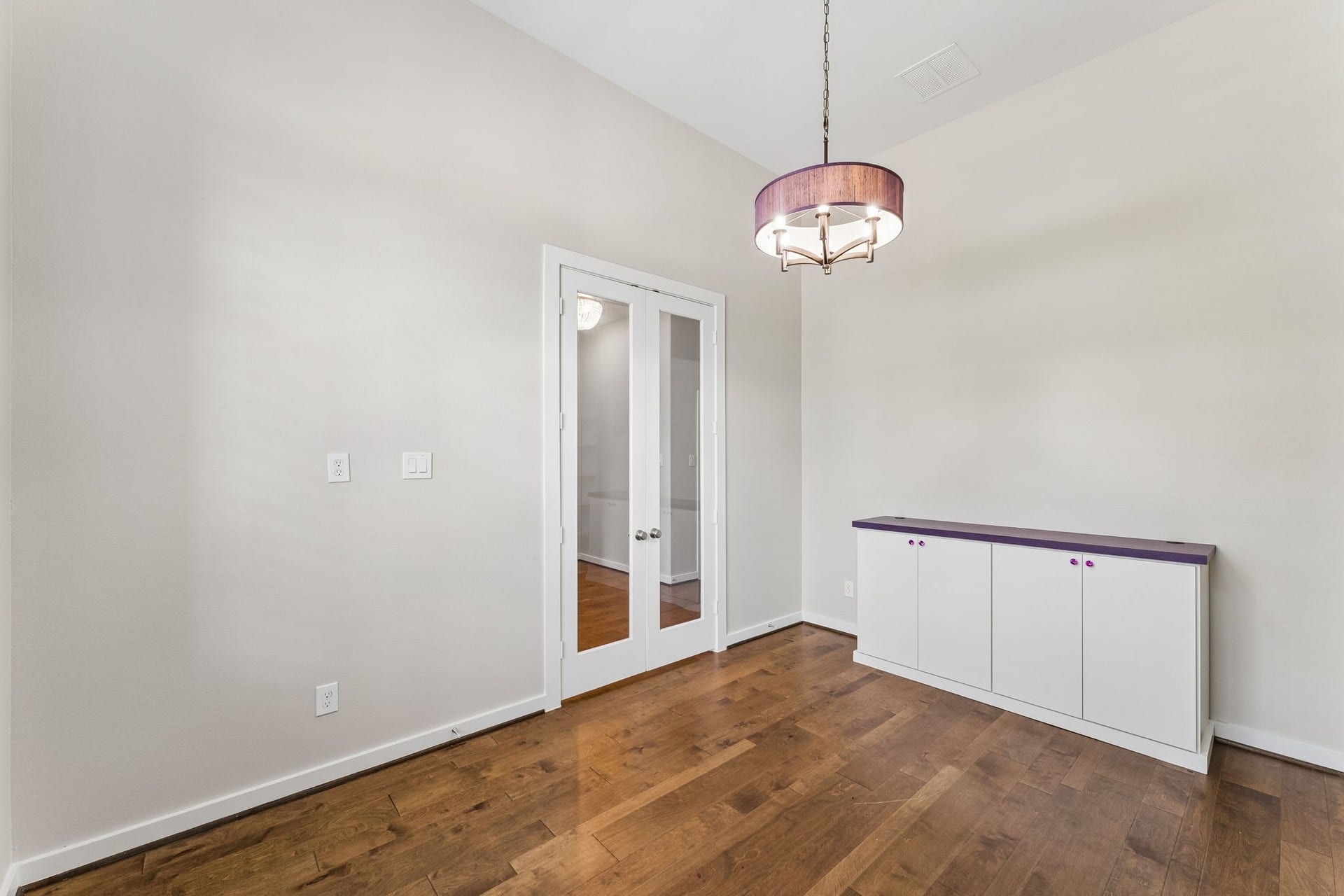 30410 Myrtle Oak Drive, Fulshear, TX 77423 Elegant hardwood floors and double doors create an upscale space for peace and quiet when working.