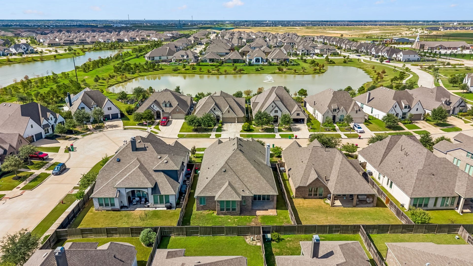 30410 Myrtle Oak Drive, Fulshear, TX 77423 Jordan Ranch offers many amenities and beautiful lakes to enjoy.
