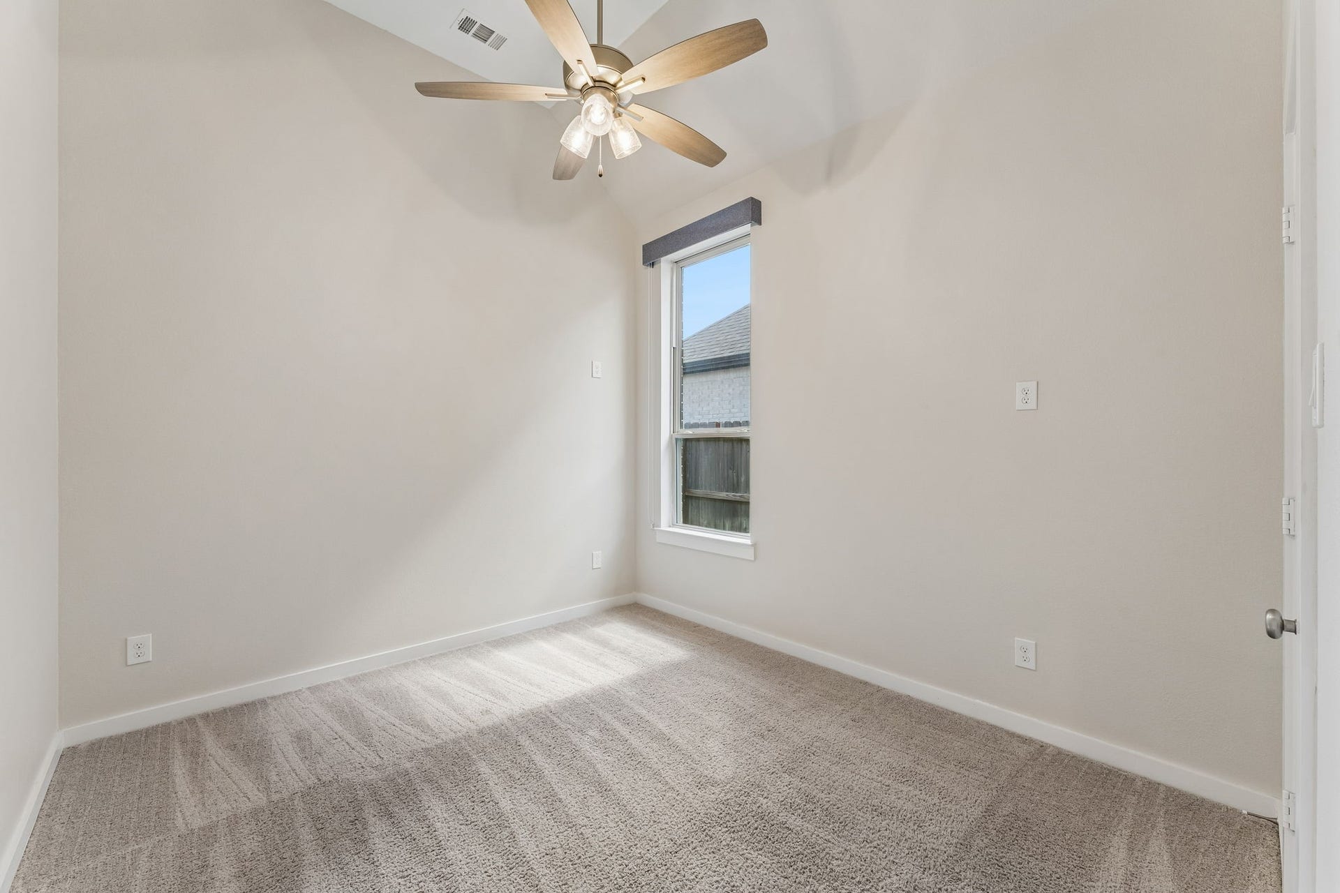 30410 Myrtle Oak Drive, Fulshear, TX 77423 Spacious secondary bedroom featuring plush carpeting, a modern ceiling fan, and a generous walk-in closet.