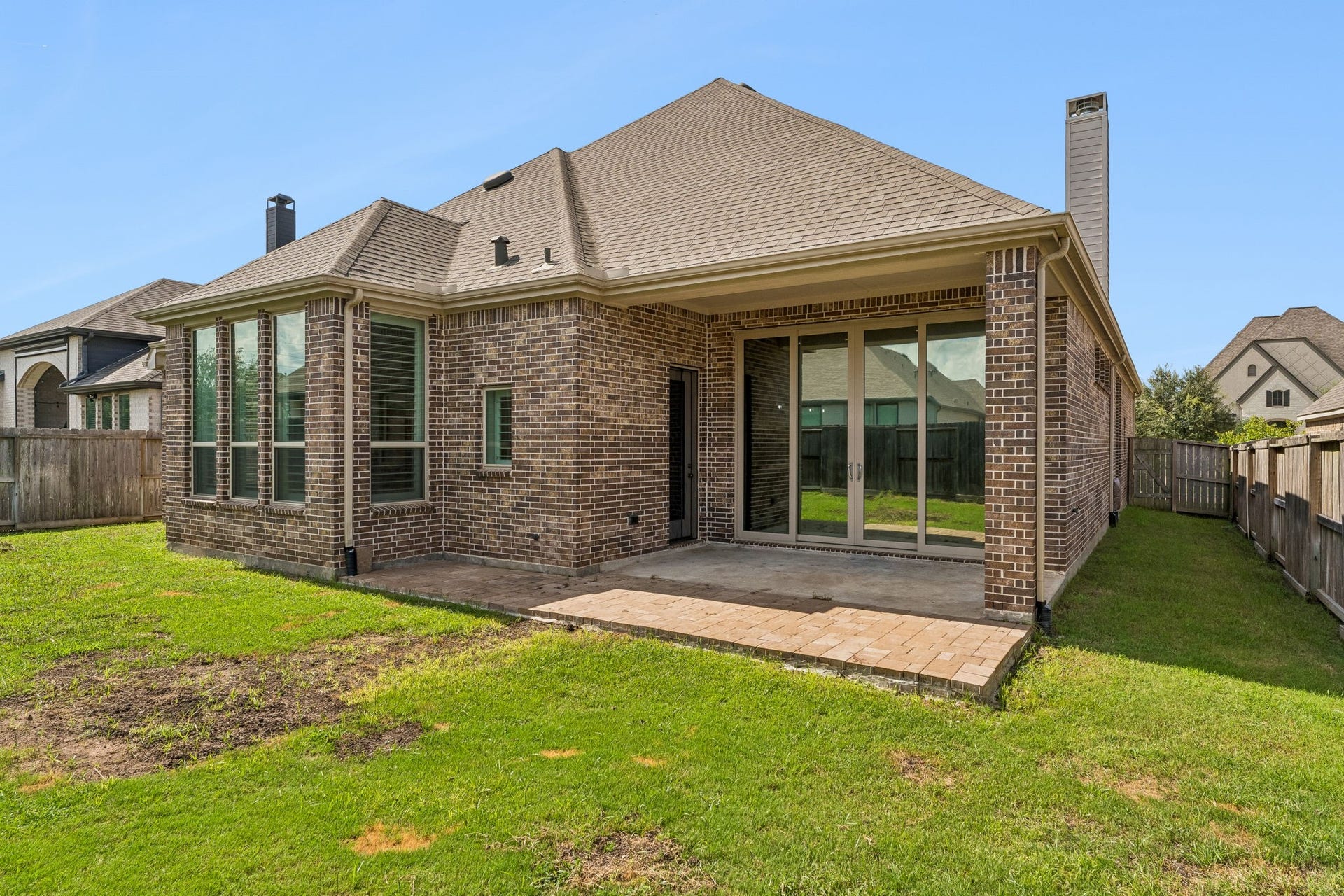 30410 Myrtle Oak Drive, Fulshear, TX 77423 Spacious back deck provides ample space for all of your outdoor activities, perfect for hosting summer barbecues, evening relaxation, or quiet morning coffee.