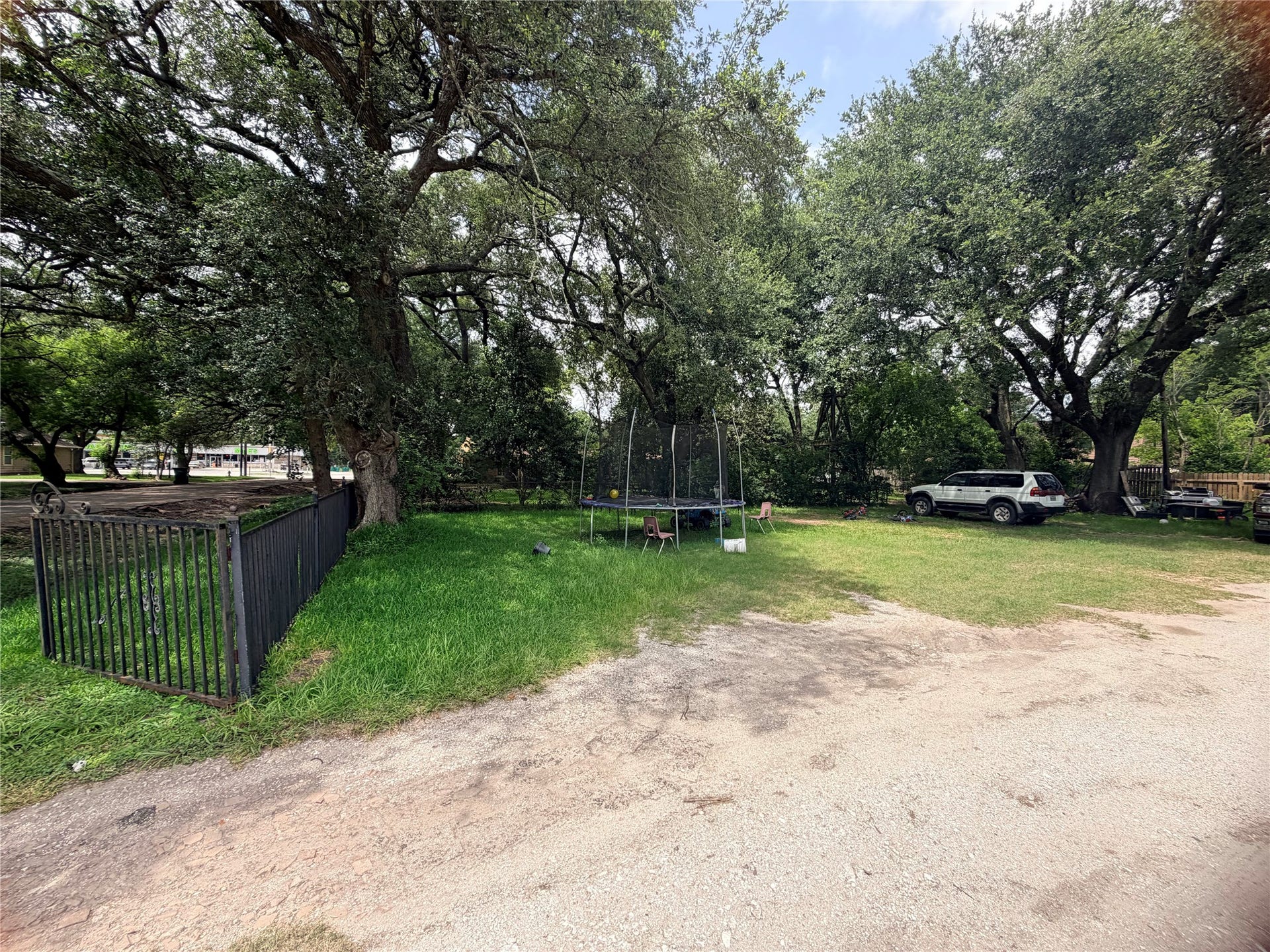 1207 Pirtle Street, La Marque, TX 77568 Enjoy the beauty of mature oak trees creating a peaceful setting while offering plenty of space for your future plans.