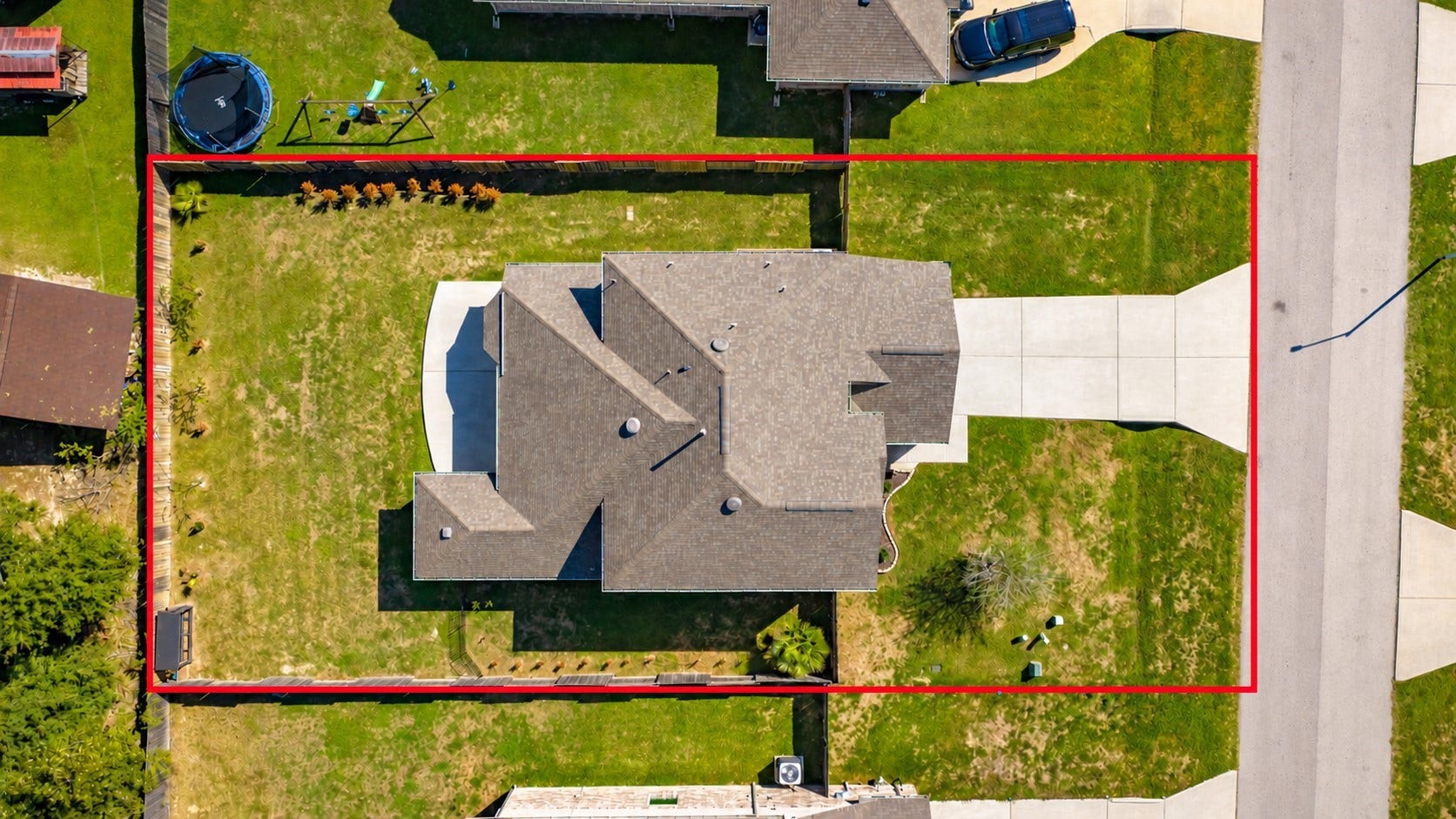 655 W Linnwood Drive, Woodbranch, TX 77357 Aerial view showcasing the expansive, fully fenced backyard with ample usable space for outdoor living, entertaining, and endless possibilities!