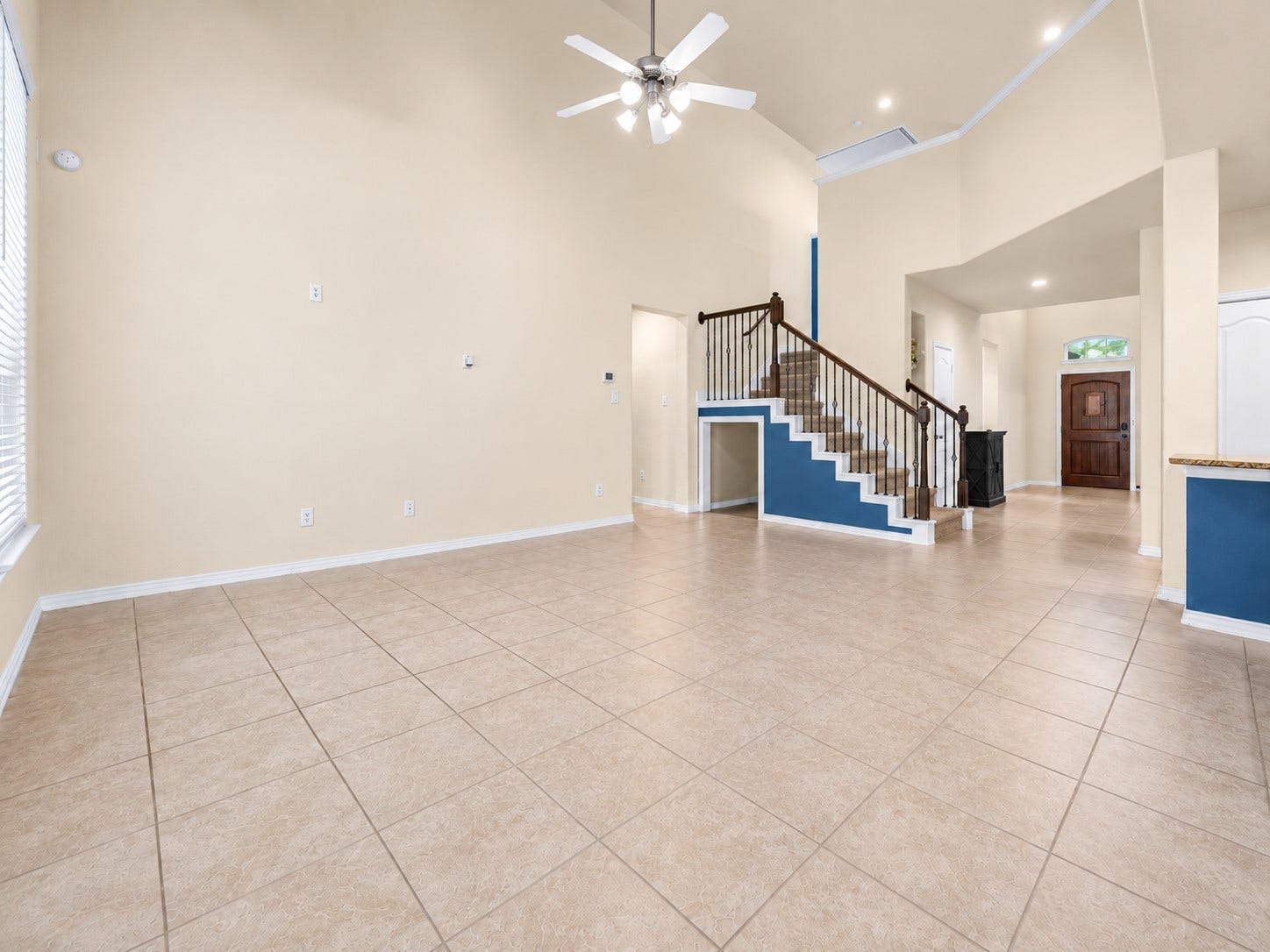 655 W Linnwood Drive, Woodbranch, TX 77357 Feel right at home in this family room - featuring soaring ceilings, beautiful natural light, and an expansive, open design that showcases the home's impressive sense of space and inviting atmosphere!