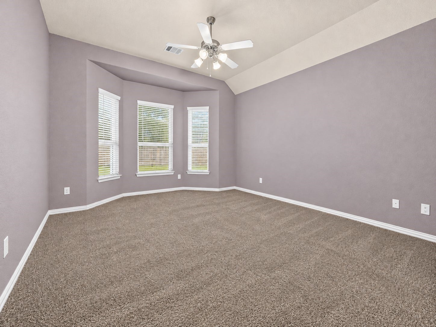 655 W Linnwood Drive, Woodbranch, TX 77357 Luxurious first-floor primary suite with a private ensuite bath.
