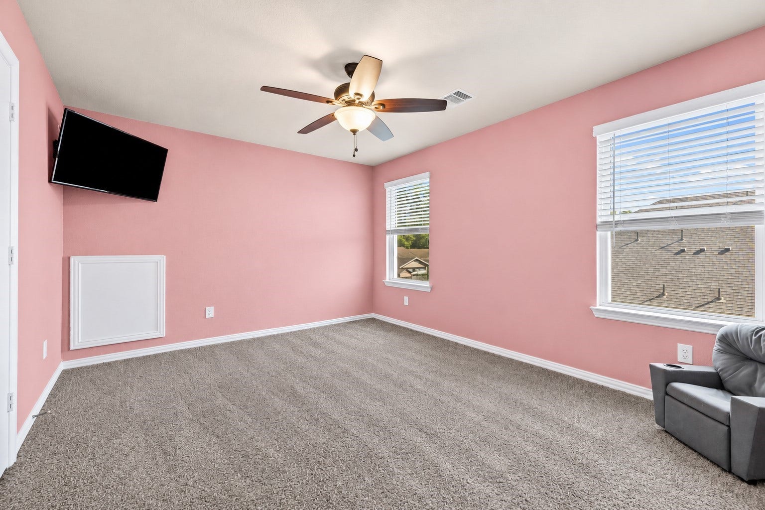 655 W Linnwood Drive, Woodbranch, TX 77357 Spacious upstairs bedroom with abundant natural light and room to make it your own!