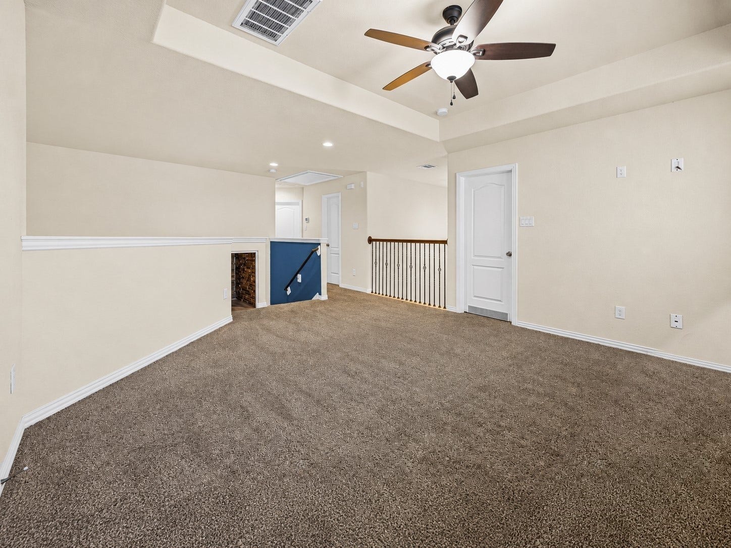 655 W Linnwood Drive, Woodbranch, TX 77357 Spacious second floor bonus area ideal for a game room, media lounge, home office, or cozy retreat tailored to your lifestyle!