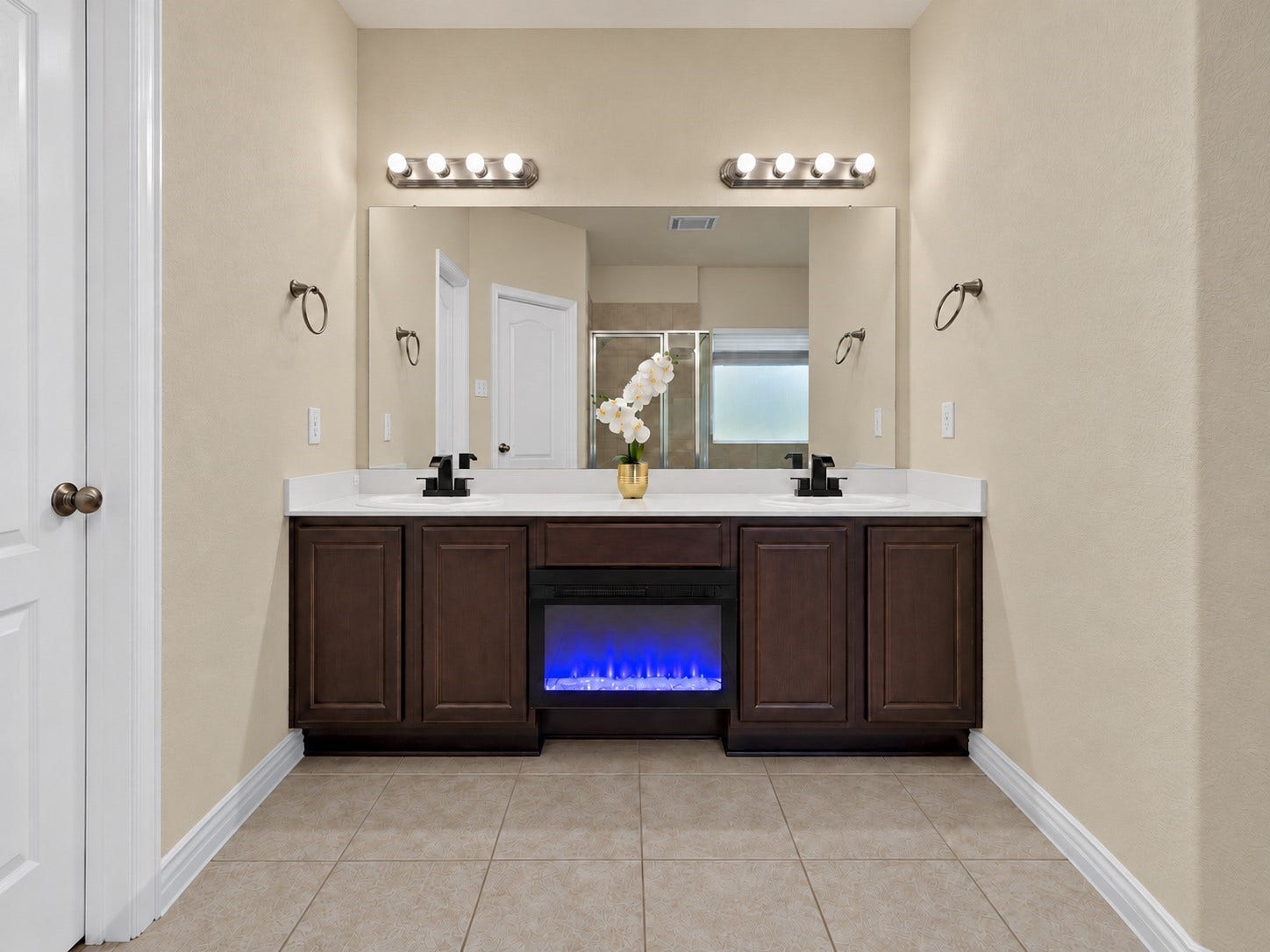 655 W Linnwood Drive, Woodbranch, TX 77357 Your own peaceful retreat! Unwind in this inviting primary bath featuring dual sinks, generous counter space, and a soothing spa-like ambiance.