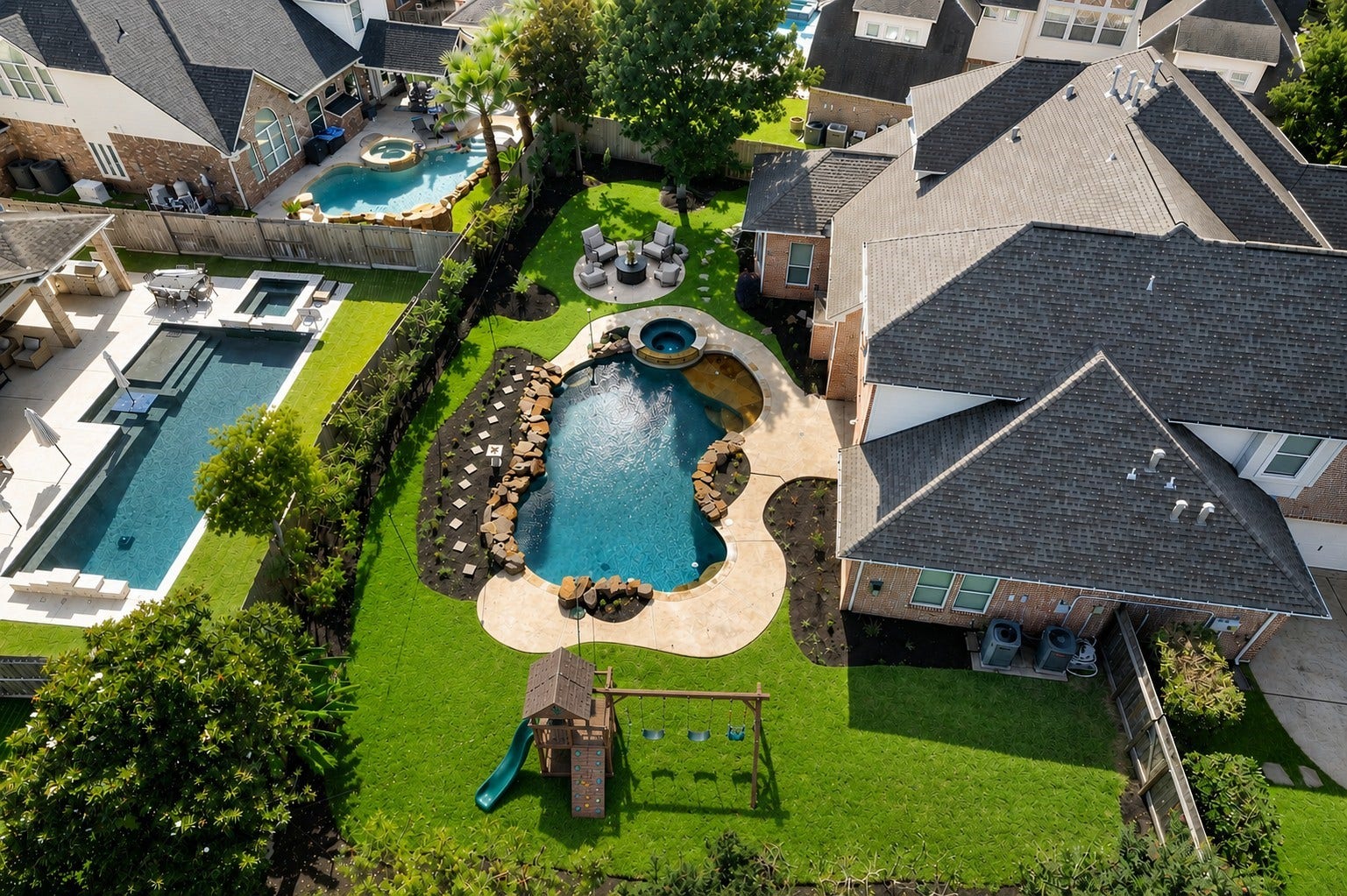 11803 Silverwood Bend Lane, Cypress, TX 77433 Stunning backyard oasis featuring a large, uniquely shaped pool with a connected spa, lush landscaping, perfect for outdoor entertainment and relaxation.