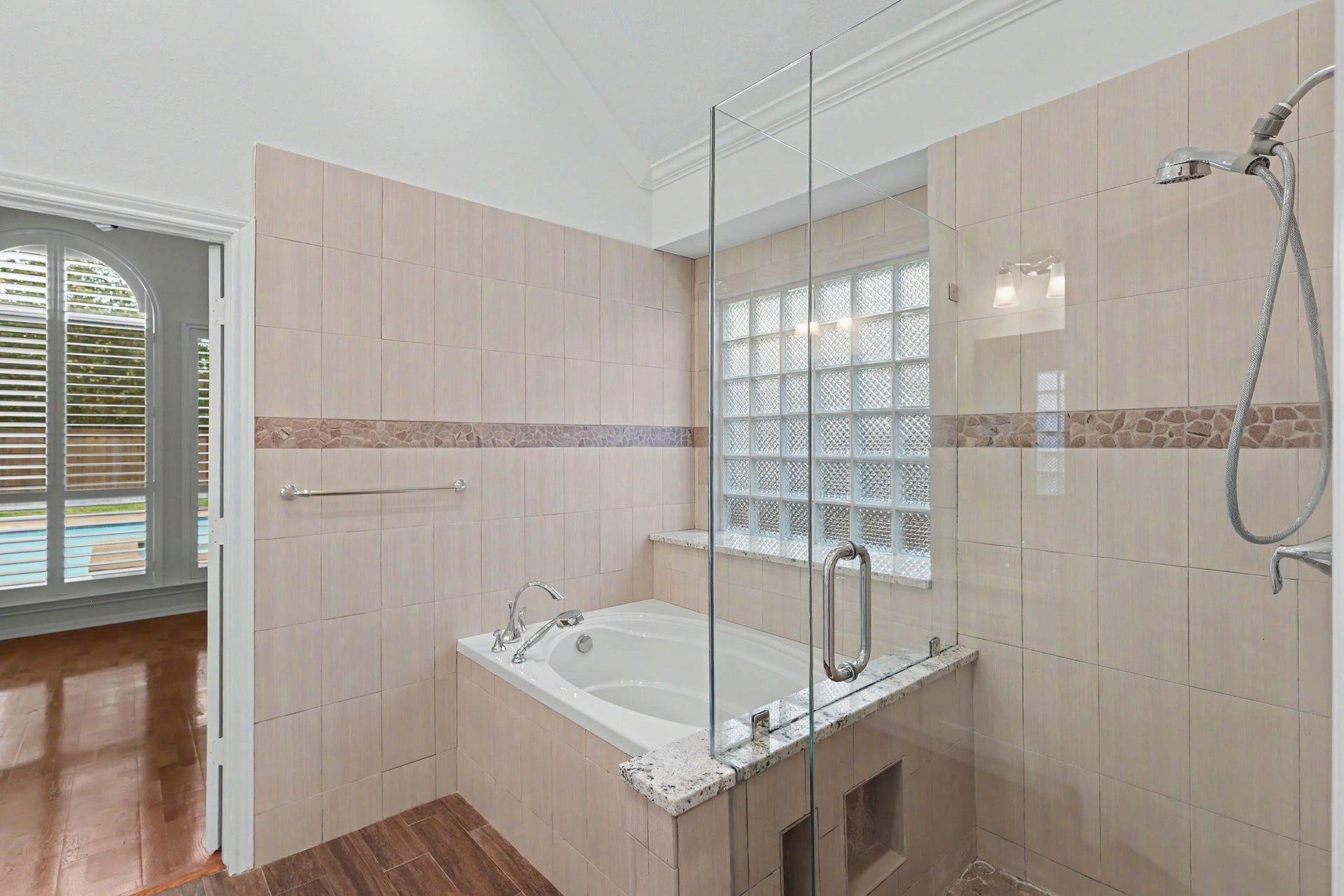 10903 Prairie Hawk Drive, Houston, TX 77064 Walk-in shower and separate tub in primary bath.