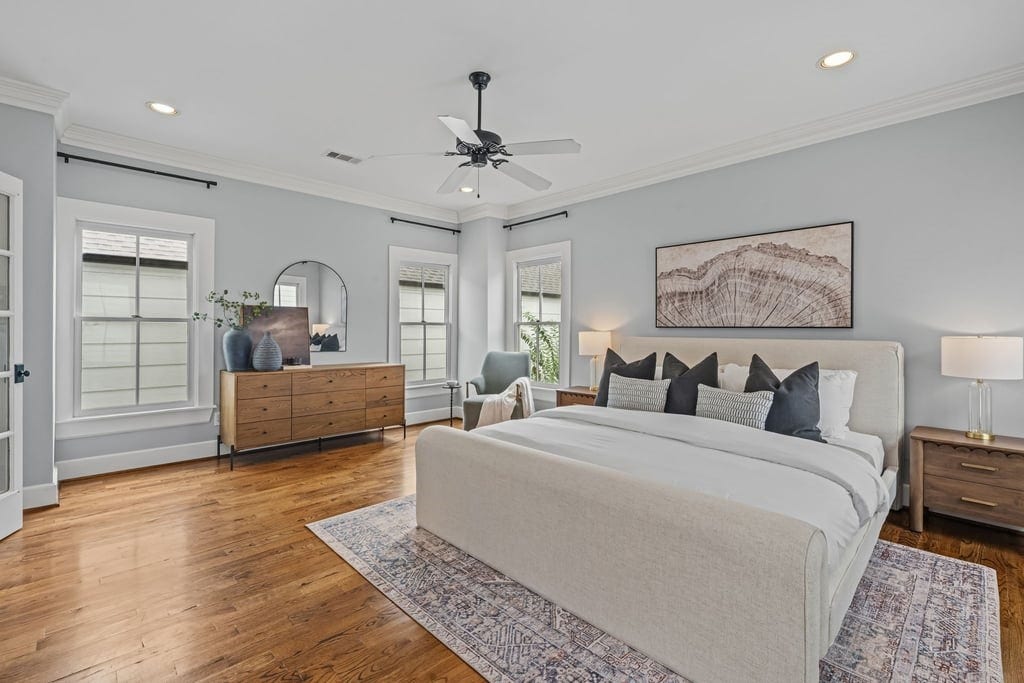 Serene primary retreat with abundant natural light and a spacious, versatile layout.