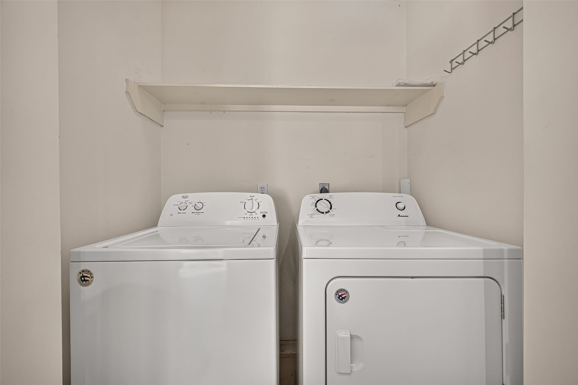 2930 Grants Lake Boulevard, #2202, Sugar Land, TX 77479 Convenient in-unit laundry area with full-size washer and dryer and overhead storage shelf.