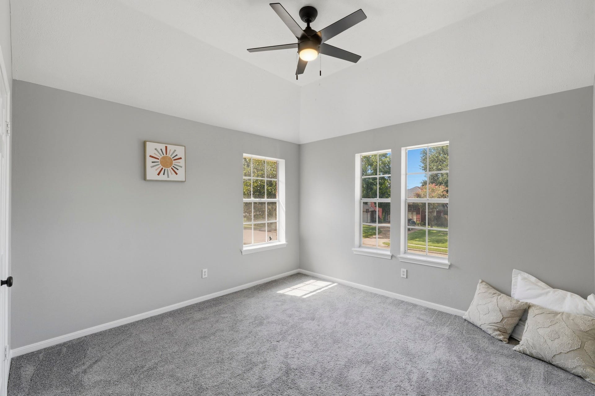 one of 3 additional secondary bedrooms upstairs. New paint and carpet and fixtures.